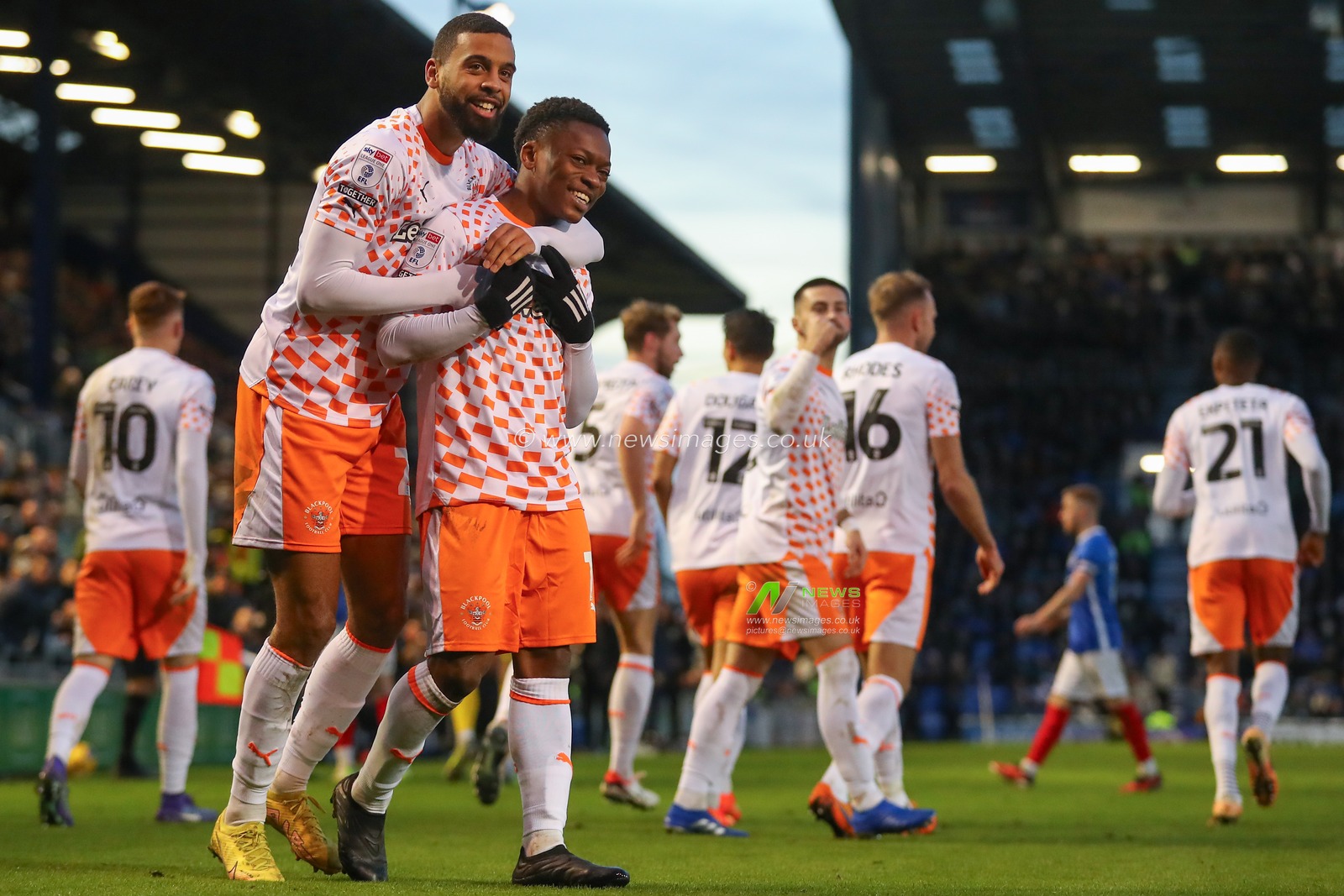 Karamoko DembÃ©lÃ© #11 of Blackpool celebrates his goal to make it 0-2 with CJ Hamilton #22 of Blackpool during the Sky Bet League 1 match Portsmouth vs Blackpool at Fratton Park, Portsmouth, United Kingdom, 25th November 2023

(Photo by Gareth Evans/News Images)