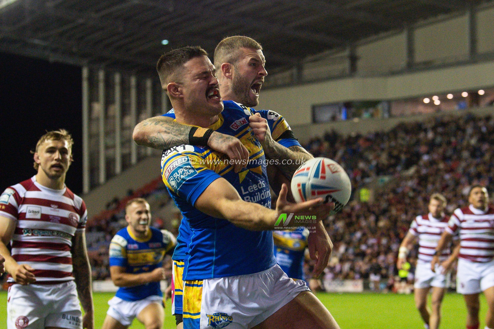 James Bentley #11 of Leeds Rhinos celebrates his try  during the Betfred Super League match Wigan Warriors vs Leeds Rhinos at DW Stadium, Wigan, United Kingdom, 16th September 2022

(Photo by Craig Thomas/News Images)