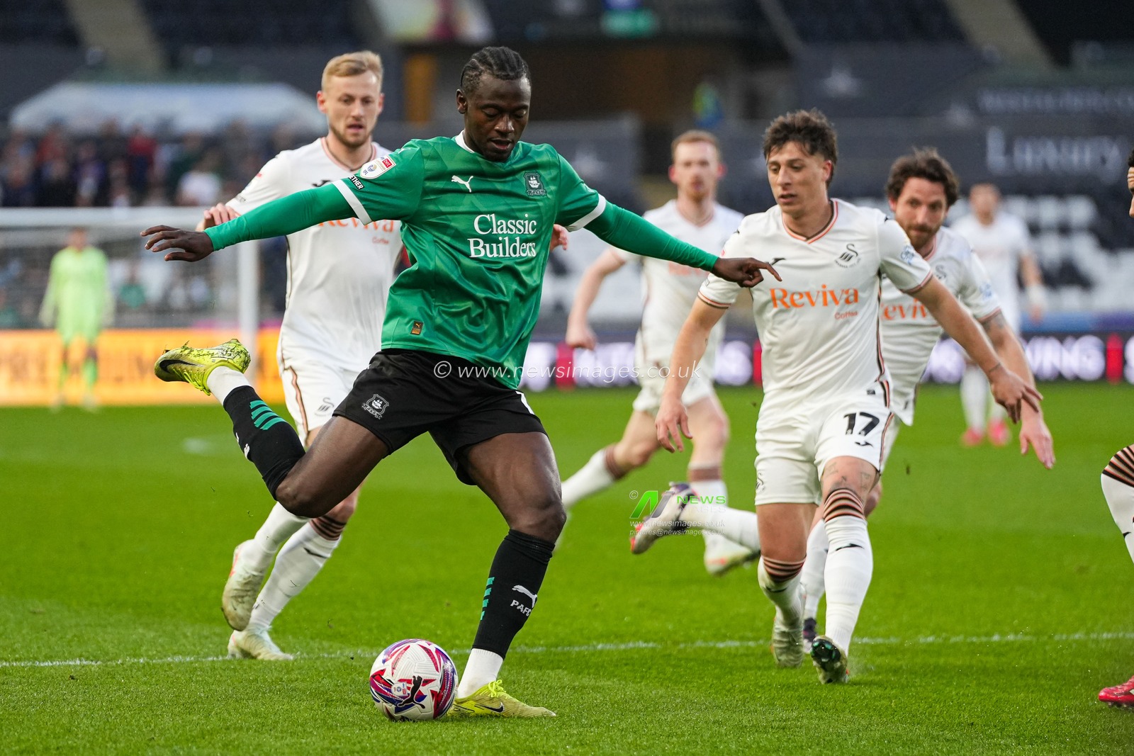 Mustapha Bundu of Plymouth Argyle has a shot during the Sky Bet Championship match Swansea City vs Plymouth Argyle at Swansea.com Stadium, Swansea, United Kingdom, 9th April 2025

(Photo by Andrew Lewis/News Images)