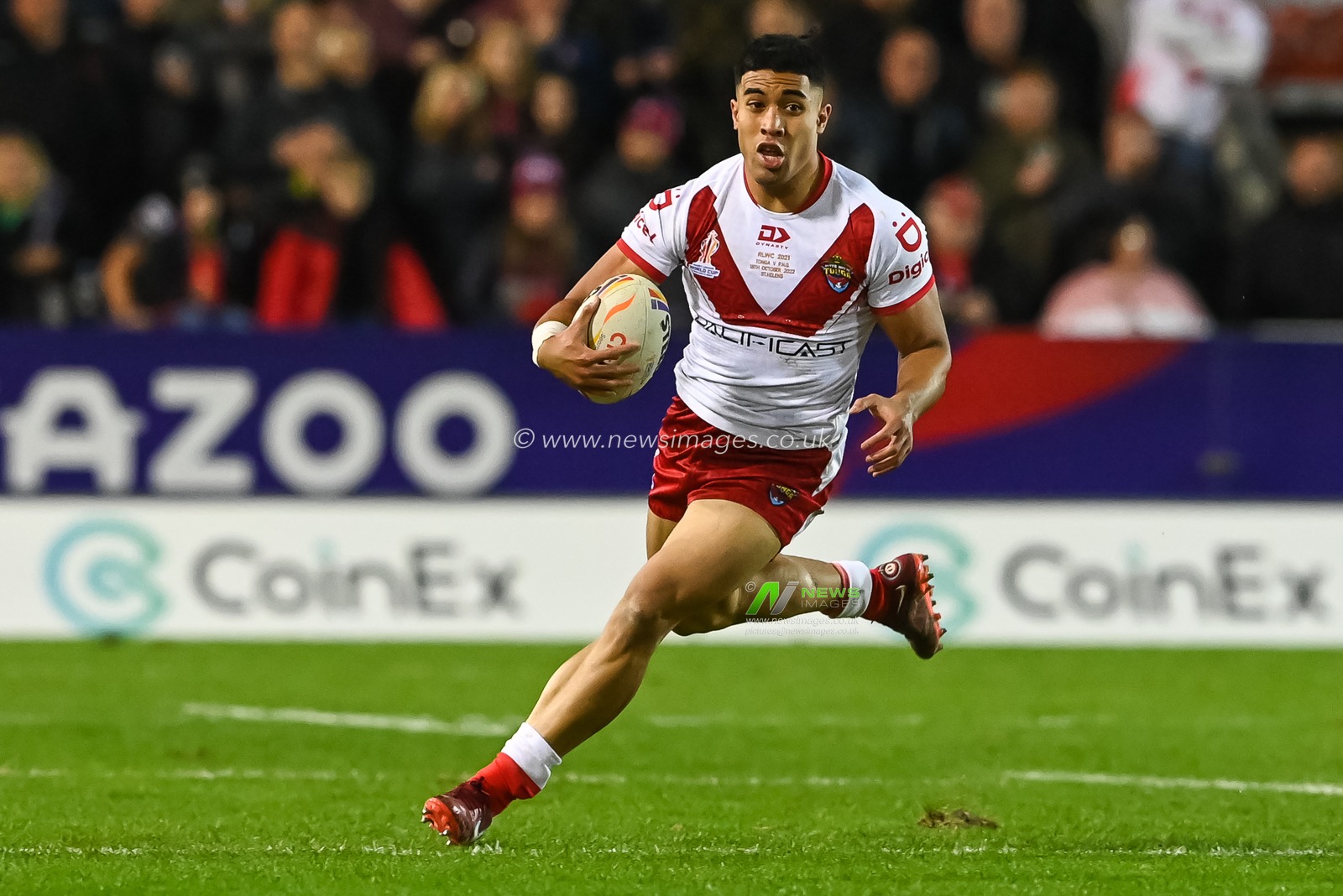 Tolutaâ€™u Koula of Tonga makes a break during the Rugby League World Cup 2021 match Tonga vs Papua New Guinea at Totally Wicked Stadium, St Helens, United Kingdom, 18th October 2022

(Photo by Craig Thomas/News Images)