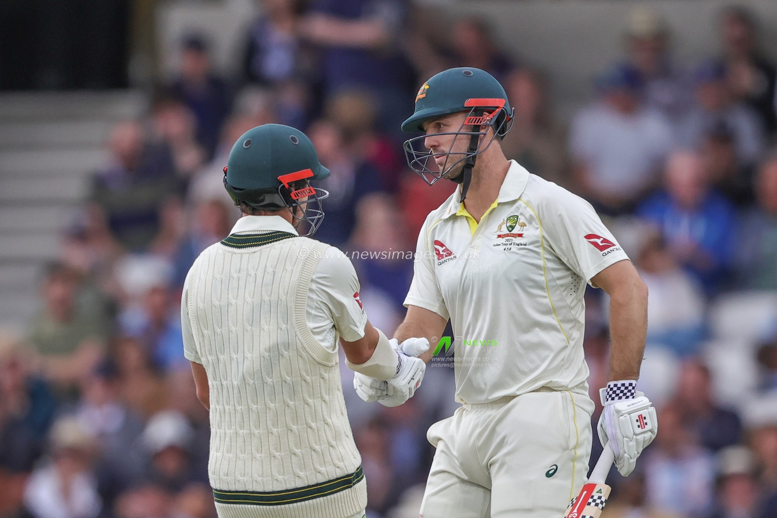 Travis Head of Australia congratulates Mitchell Marsh of Australia on his half century (50 runs) during the LV= Insurance Ashes Third Test Series Day 1 England v Australia at Headingley Stadium, Leeds, United Kingdom, 6th July 2023

(Photo by Mark Cosgrove/News Images)