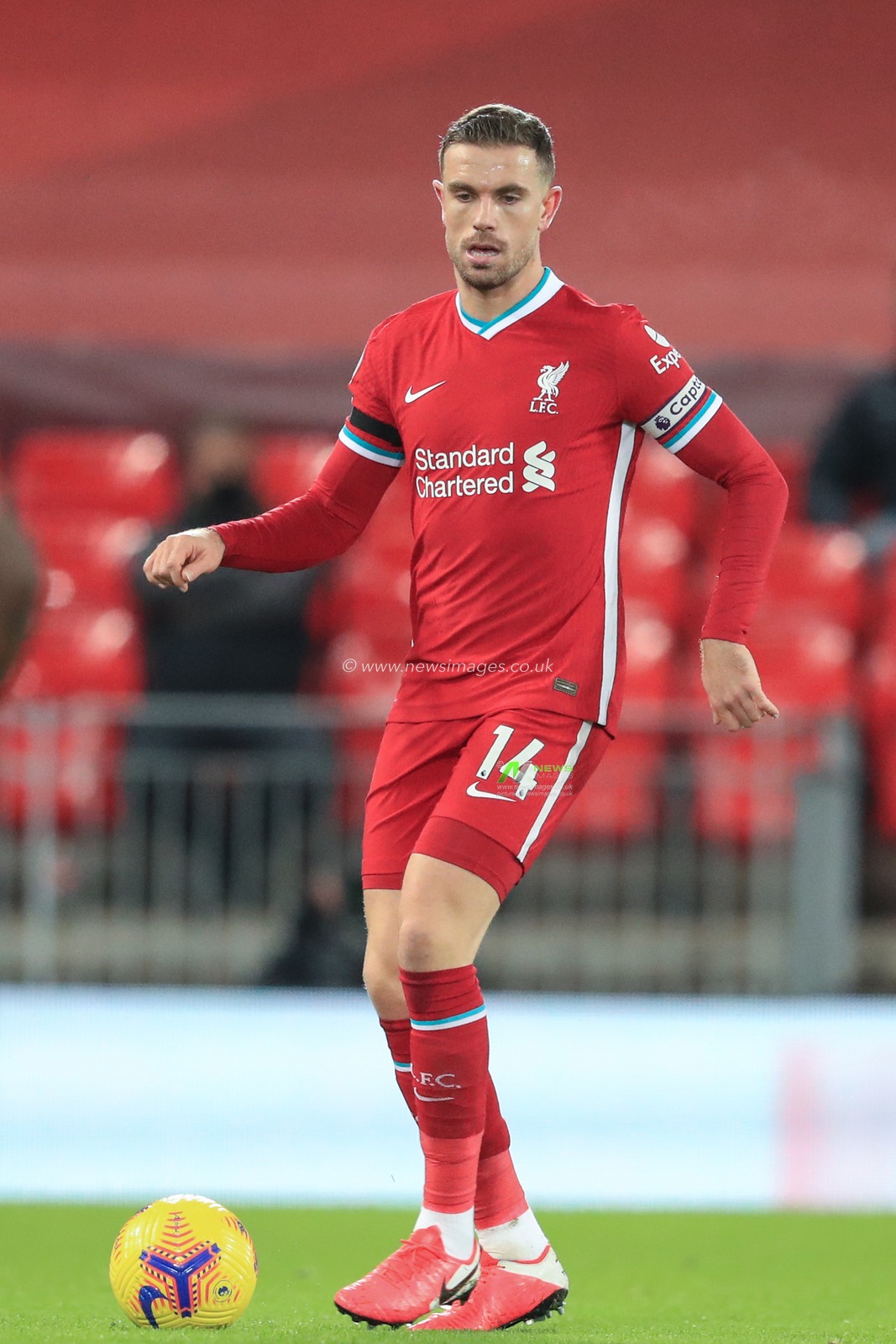 Jordan Henderson #14 of Liverpool during the game