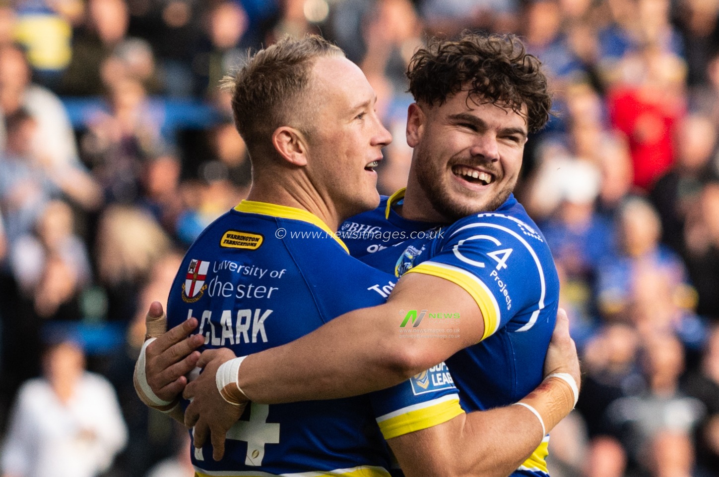 12th July 2019 , Halliwell Jones Stadium, Warrington, England;  Betfred Super League, Round 22, Warrington Wolves vs Salford Red Devils ; Jason Clark of Warrington Wolves celebrates scoring his try with Joe Philbin of Warrington Wolves 

Credit: Richard Long/News Images