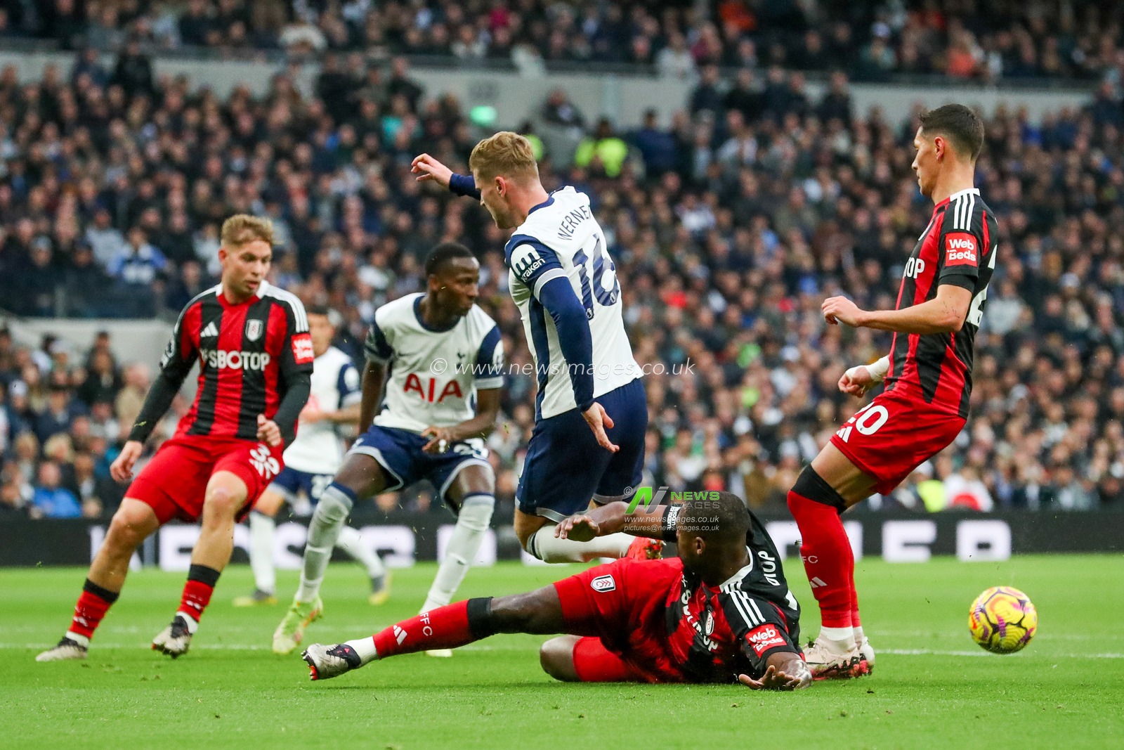Timo Werner of Tottenham Hotspur is challenged by Issa Diop of Fulham during the Premier League match Tottenham Hotspur vs Fulham at Tottenham Hotspur Stadium, London, United Kingdom, 1st December 2024

(Photo by Izzy Poles/News Images)
