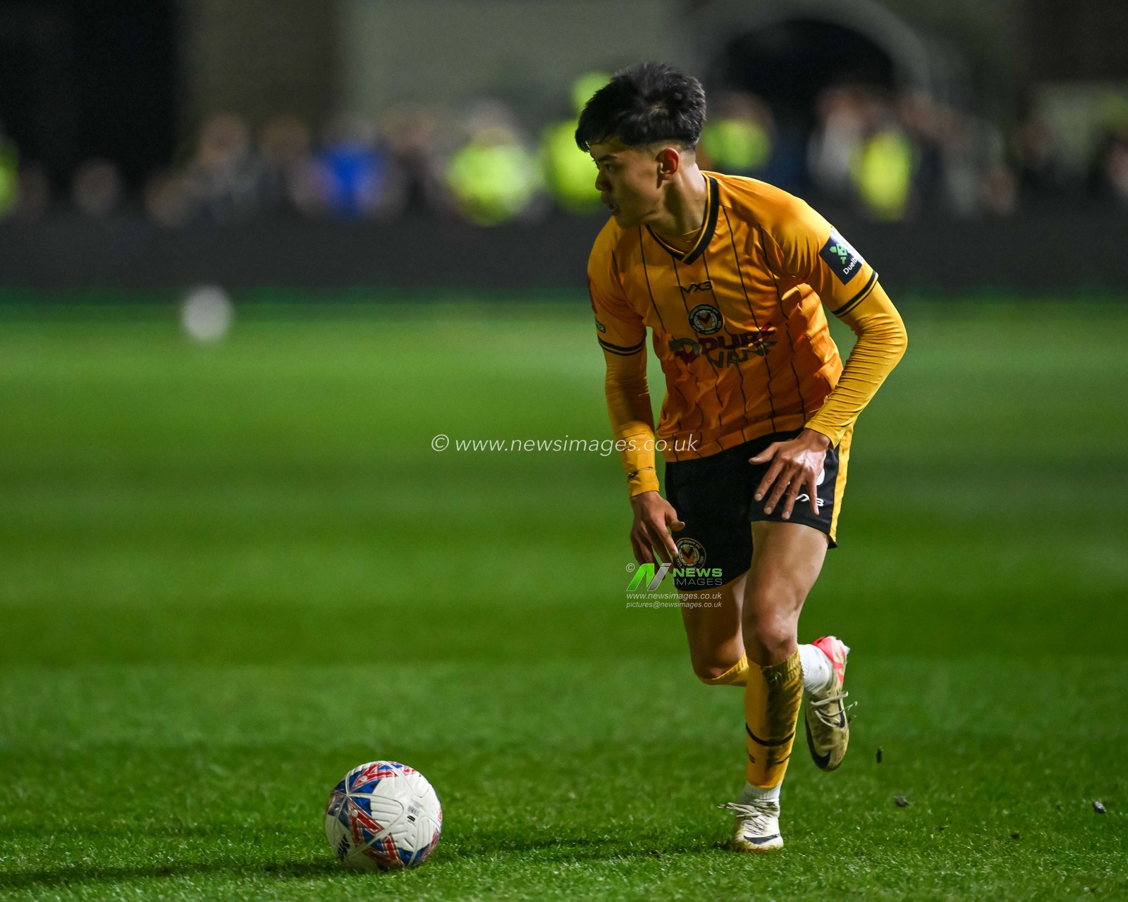 Kiban Rai of Newport County makes a break with the ball during the Emirates FA Cup Fourth Round match Newport County vs Manchester United at Rodney Parade, Newport, United Kingdom, 28th January 2024

(Photo by Craig Thomas/News Images)