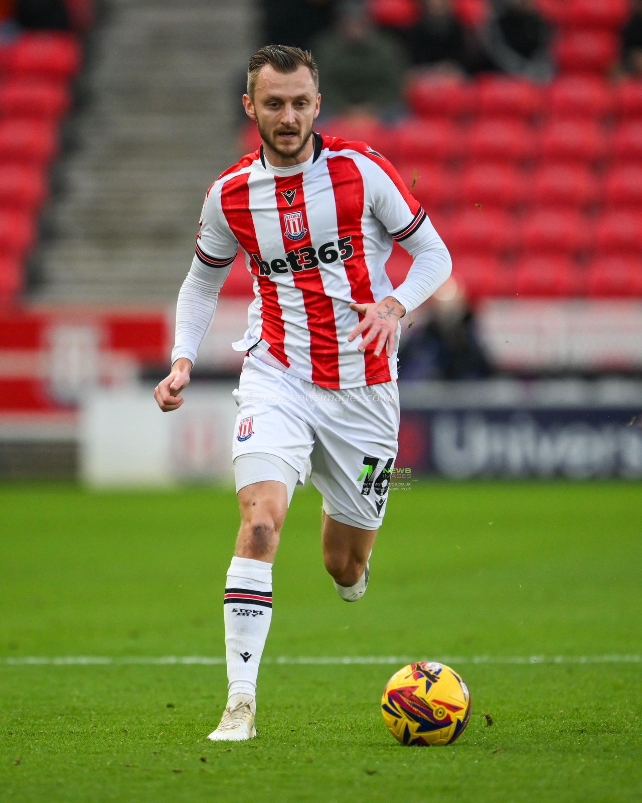 Ben Wilmot of Stoke Cit ymakes a break with the ball  during the Sky Bet Championship match Stoke City vs Cardiff City at Bet365 Stadium, Stoke-on-Trent, United Kingdom, 14th December 2024

(Photo by Craig Thomas/News Images)