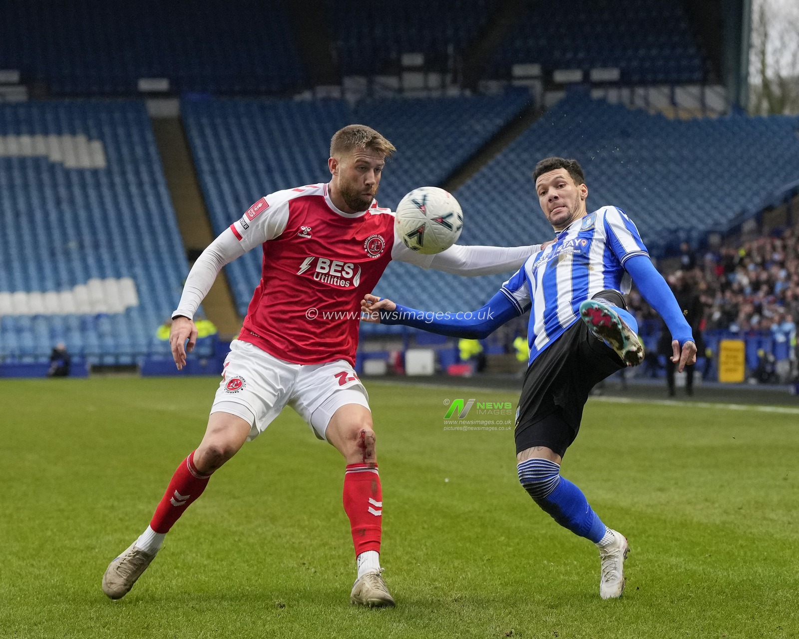 Shaun Rooney #26 of Fleetwood Town competes for the ball with  Marvin Johnson #18 of Sheffield Wednesday during the Emirates FA Cup Fourth Round match Sheffield Wednesday vs Fleetwood Town at Hillsborough, Sheffield, United Kingdom, 28th January 2023

(Photo by Steve Flynn/News Images)