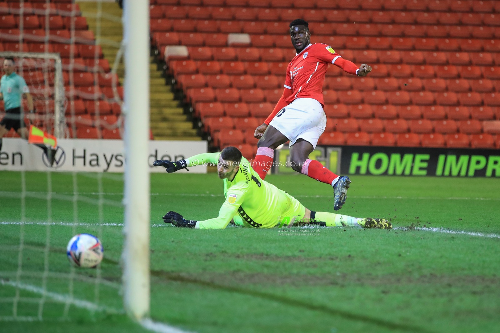Daryl Dike #10 of Barnsley scores to make it 2-0