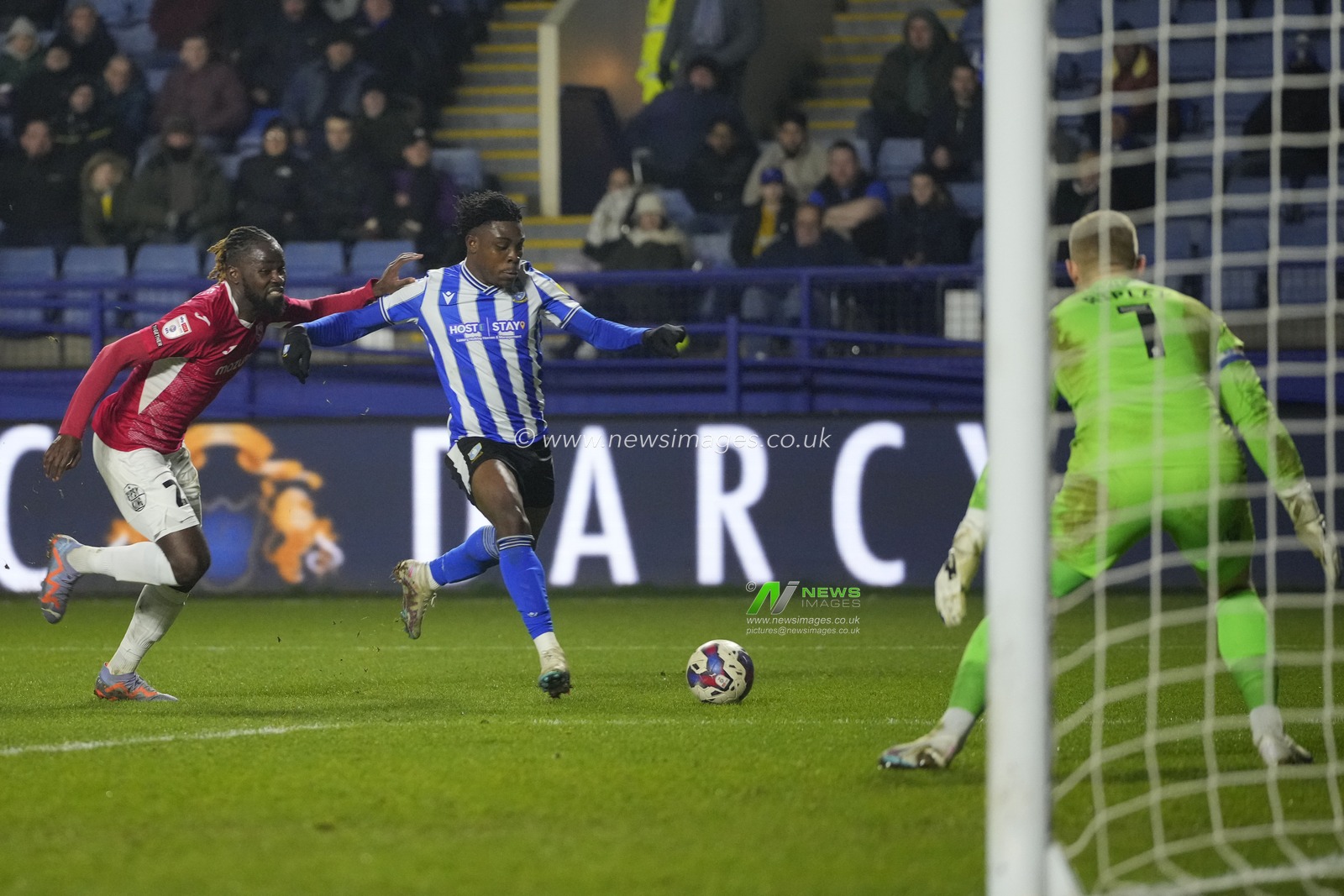 Fisayo Dele-Bashiru #17 of Sheffield Wednesday crosses for his sides third goal during the Sky Bet League 1 match Sheffield Wednesday vs Morecambe at Hillsborough, Sheffield, United Kingdom, 14th February 2023

(Photo by Steve Flynn/News Images)