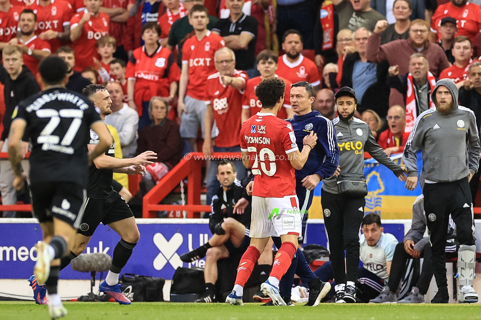 Brennan Johnson #20 of Nottingham Forest and Paul Heckingbottom manager of Sheffield United after an incident with Djed Spence #2 of Nottingham Forest and Heckingbottom