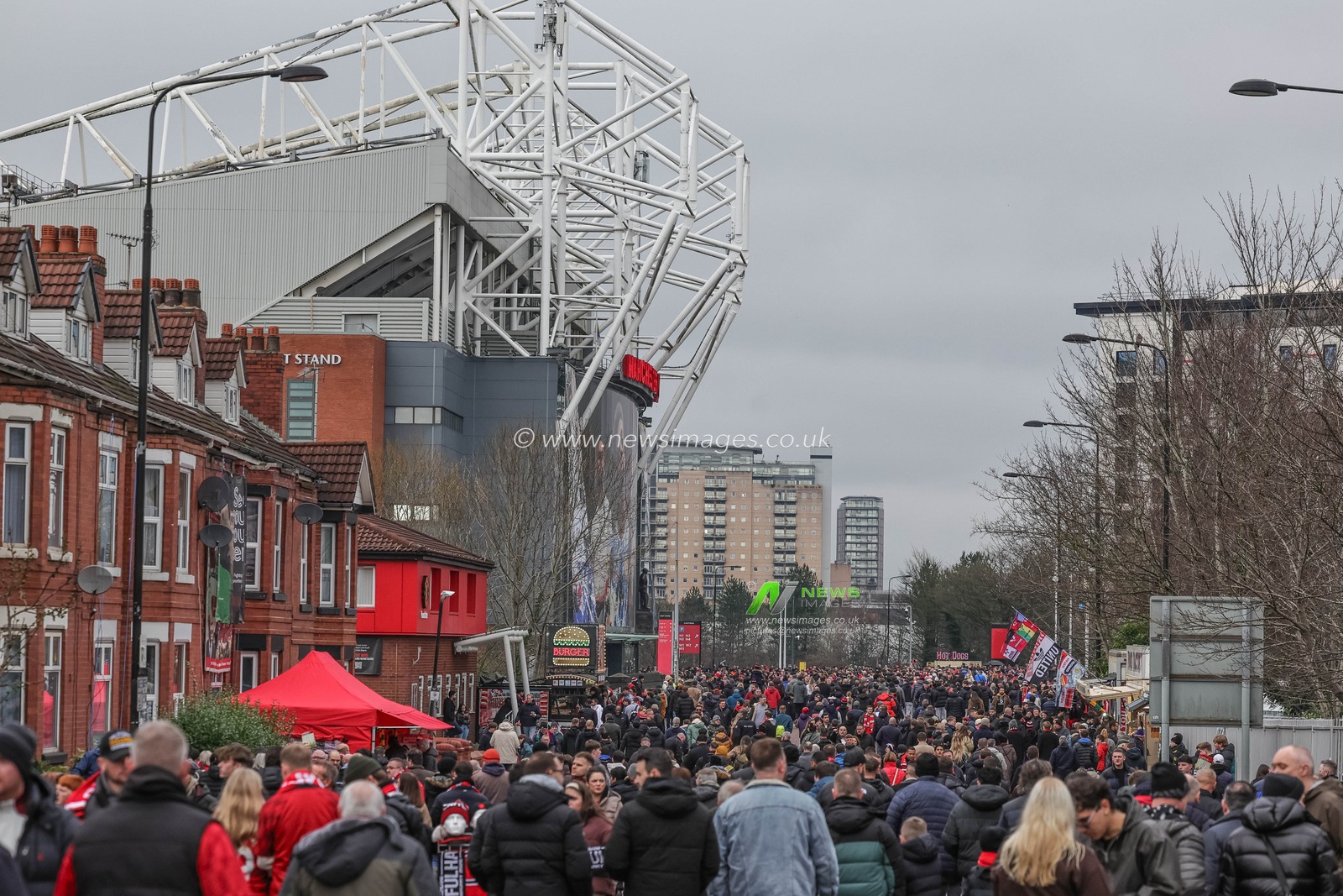 Manchester United fans make their way to Old Trafford during the Premier League match Manchester United vs Fulham at Old Trafford, Manchester, United Kingdom, 1st February 2026

(Photo by Mark Cosgrove/News Images)