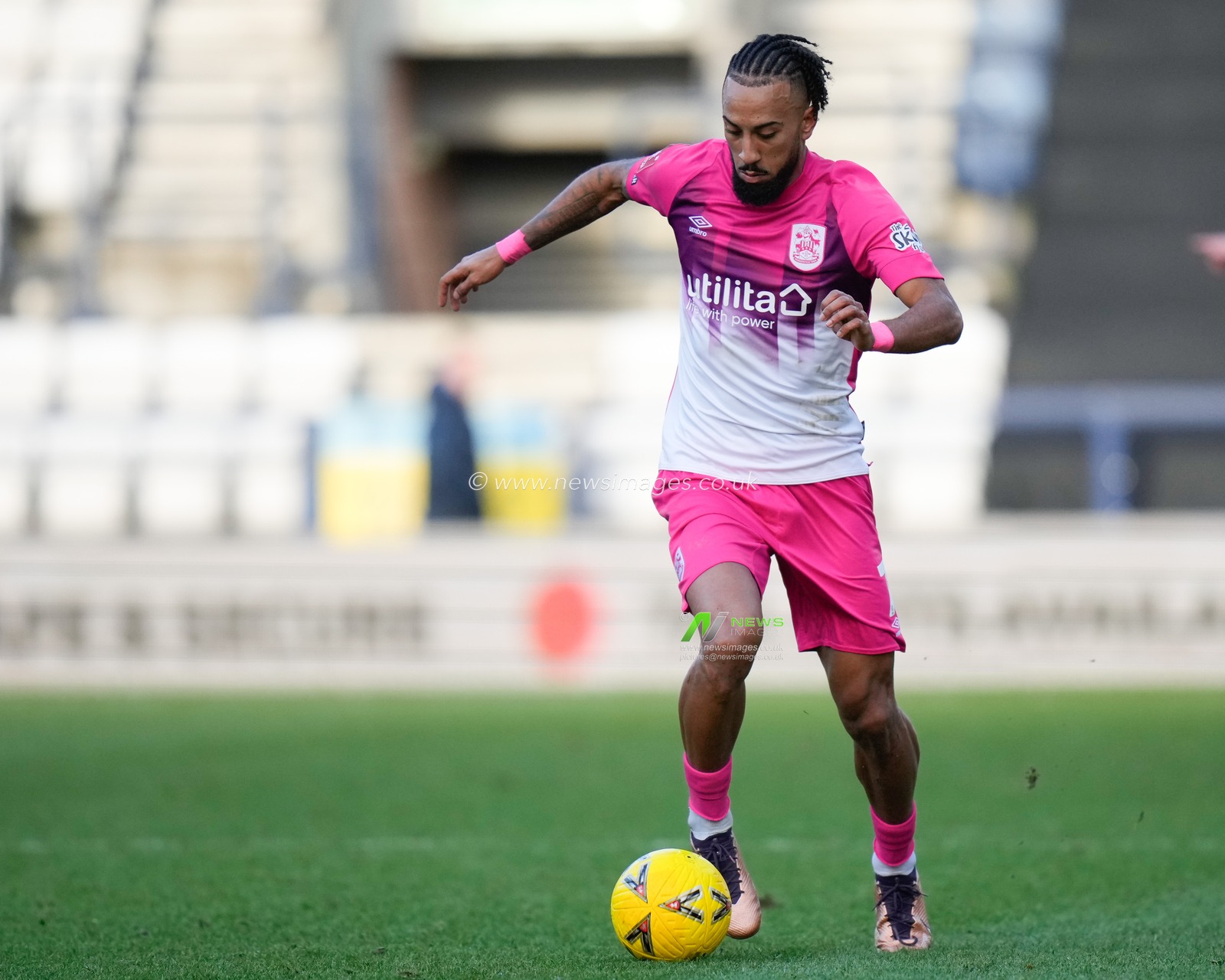 Sorba Thomas #7 of Huddersfield Town makes a break during the Emirates FA Cup Third Round match Preston North End vs Huddersfield Town at Deepdale, Preston, United Kingdom, 7th January 2023

(Photo by Steve Flynn/News Images)
