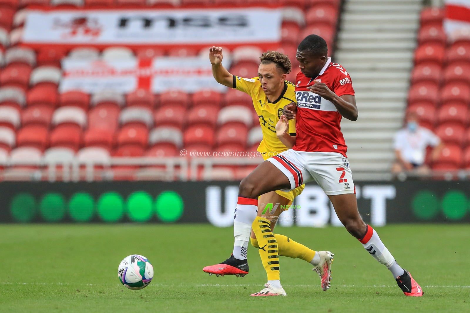 Jordan Williams (2) of Barnsley and Anfernee Dijksteel (2) of Middlesbrough battle for the ball