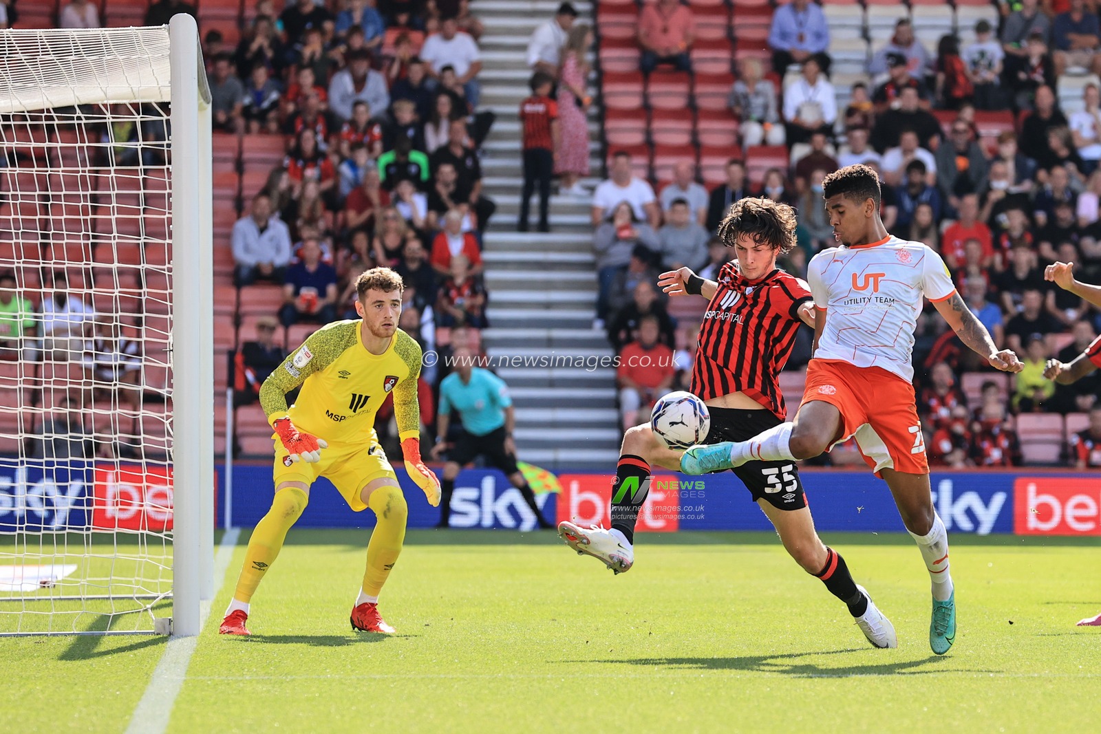 Tyreece John-Jules #28 of Blackpool tries to flick the ball into the nets