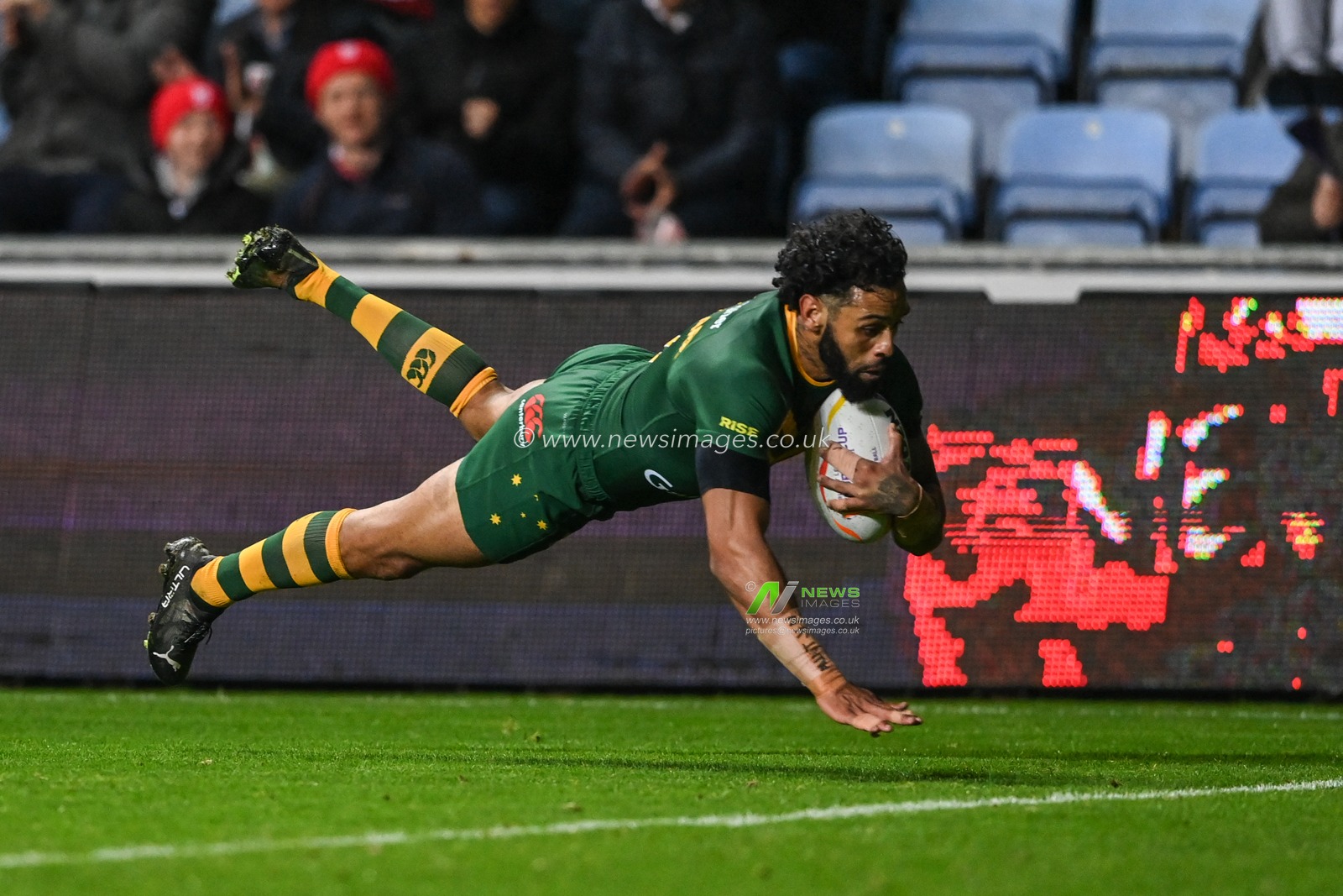 Josh Addo-Carr of Australia goes over for a try  during the Rugby League World Cup 2021 match Australia vs Scotland at Coventry Building Society Arena, Coventry, United Kingdom, 21st October 2022

(Photo by Craig Thomas/News Images)