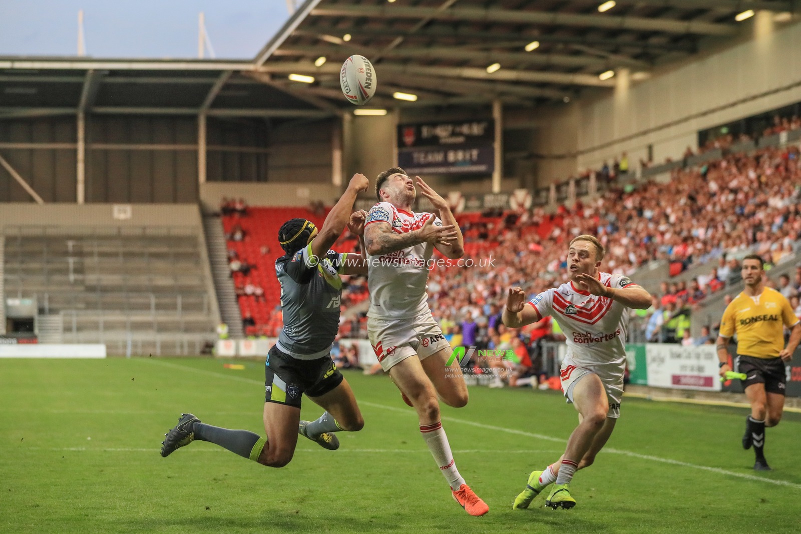 2nd August 2019 , Totally Wicked Stadium, St Helens, England;  Betfred Super League, Round 24, St Helens vs Wakefield Trinity ; Ben Jones-Bishop (5) of Wakefield Trinity punches the high ball out of reach of Mark Percival (4) of St Helens 

Credit: Mark Cosgrove/News Images