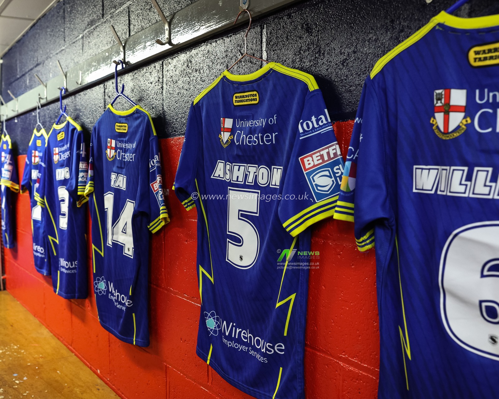 Matty Ashton of Warrington Wolves shirt in the away dressing room as he marks his 100th game for Warrington during the Betfred Super League Semi-Finals match Hull KR vs Warrington Wolves at Sewell Group Craven Park, Kingston upon Hull, United Kingdom, 4th October 2024

(Photo by Mark Cosgrove/News Images)
