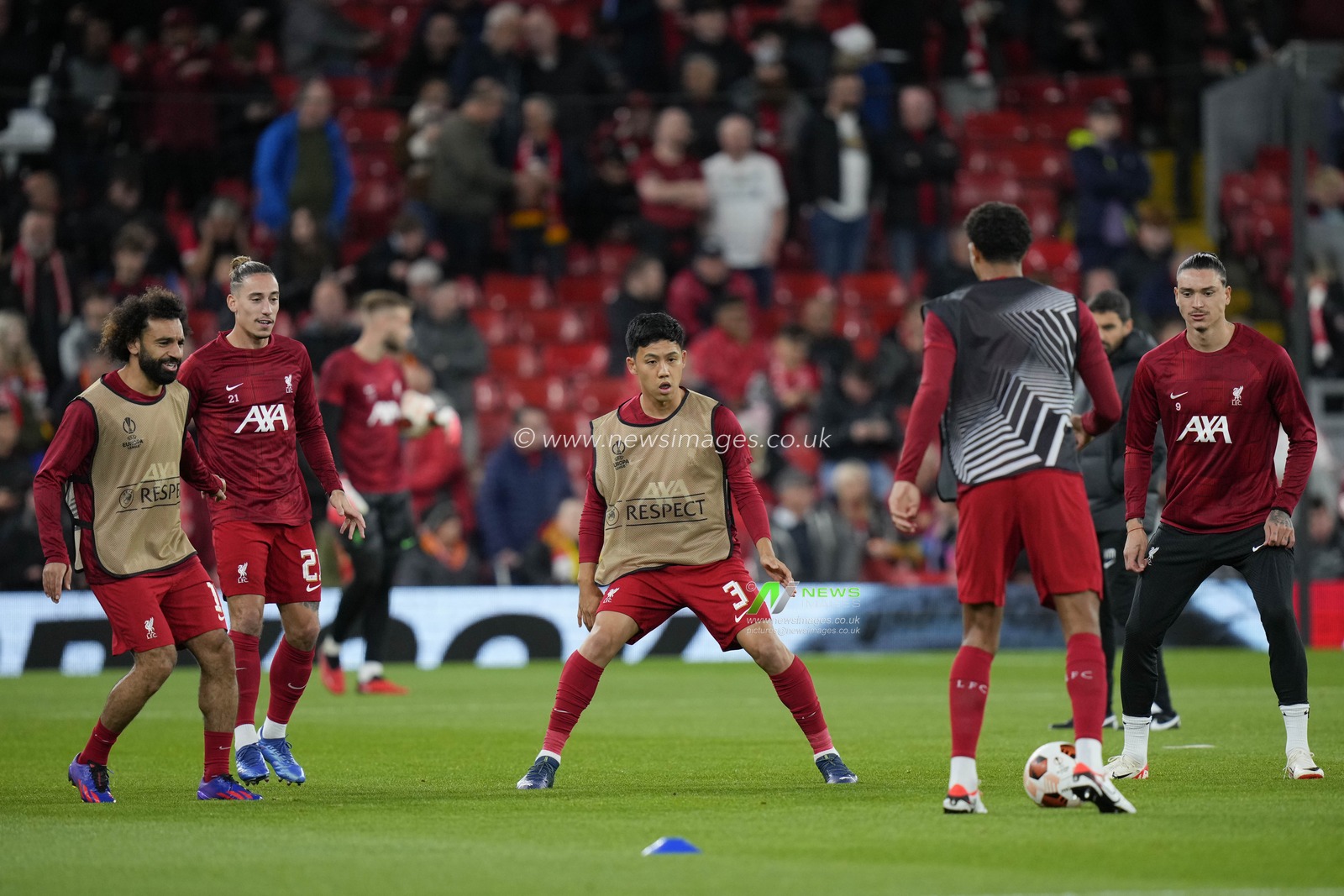 Wataru Endo #3 of Liverpool warms up with team mates before the UEFA Europa League match Liverpool vs Union Saint-Gilloise at Anfield, Liverpool, United Kingdom, 5th October 2023

(Photo by Steve Flynn/News Images)