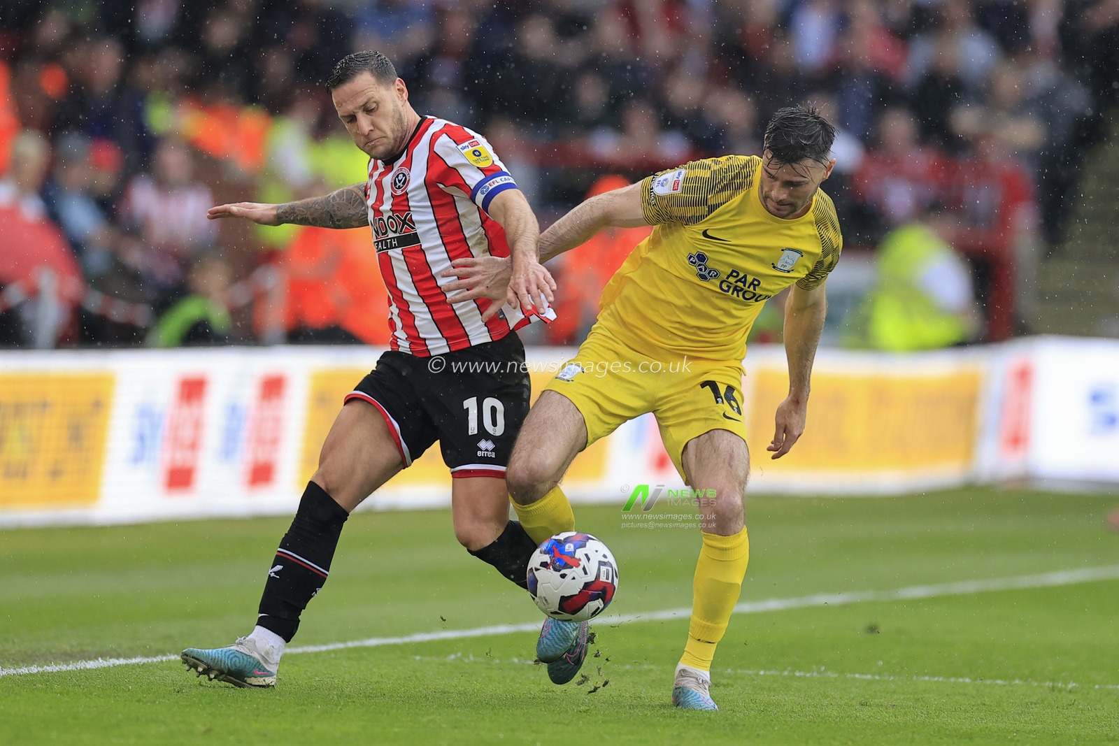 Billy Sharp #10 of Sheffield United and Andrew Hughes #16 of Preston North End challenge for the ball during the Sky Bet Championship match Sheffield United vs Preston North End at Bramall Lane, Sheffield, United Kingdom, 29th April 2023

(Photo by Conor Molloy/News Images)