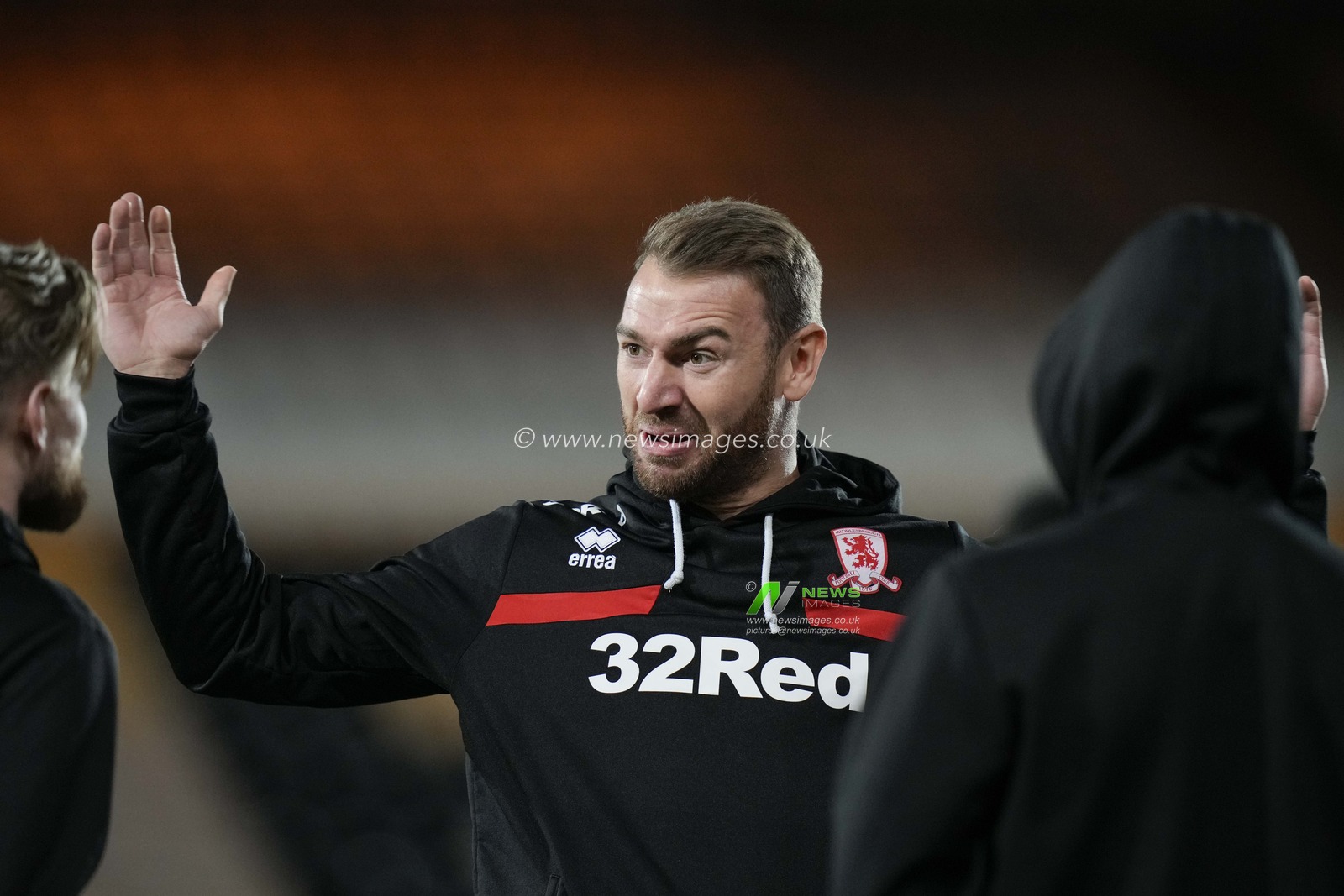 Jamie Jones #32 of Middlesbrough speaks with his team mates before the Carabao Cup Quarter Final match Port Vale vs Middlesbrough at Vale Park, Burslem, United Kingdom, 19th December 2023

(Photo by Steve Flynn/News Images)