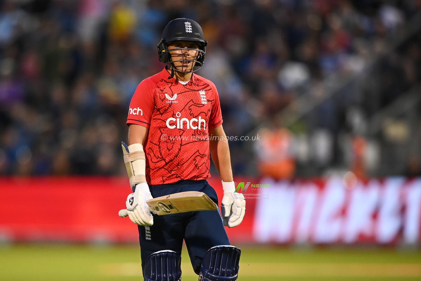 Sam Curran of England leaves the field after being caught by Keshav Maharaj of South Africa