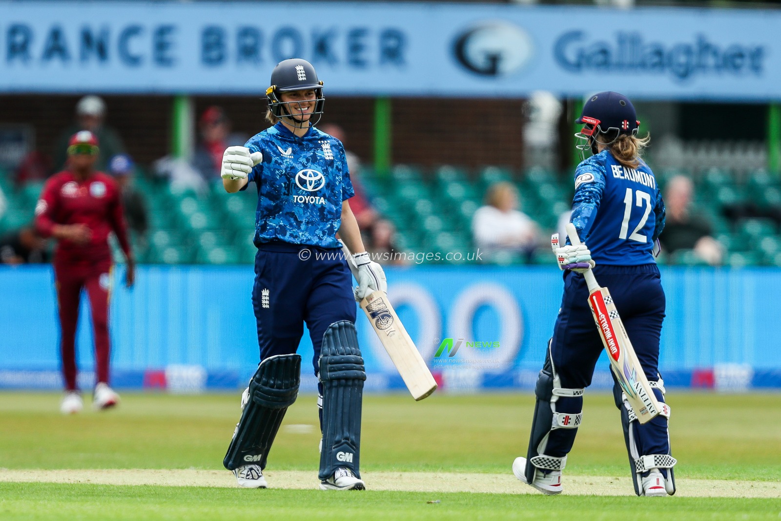 England Women celebrate a century during the 2nd Metro Bank ODI Day International England Women v West Indies Women at Uptonsteel County Ground, Leicester, United Kingdom, 4th June 2025

(Photo by Izzy Poles/News Images)
