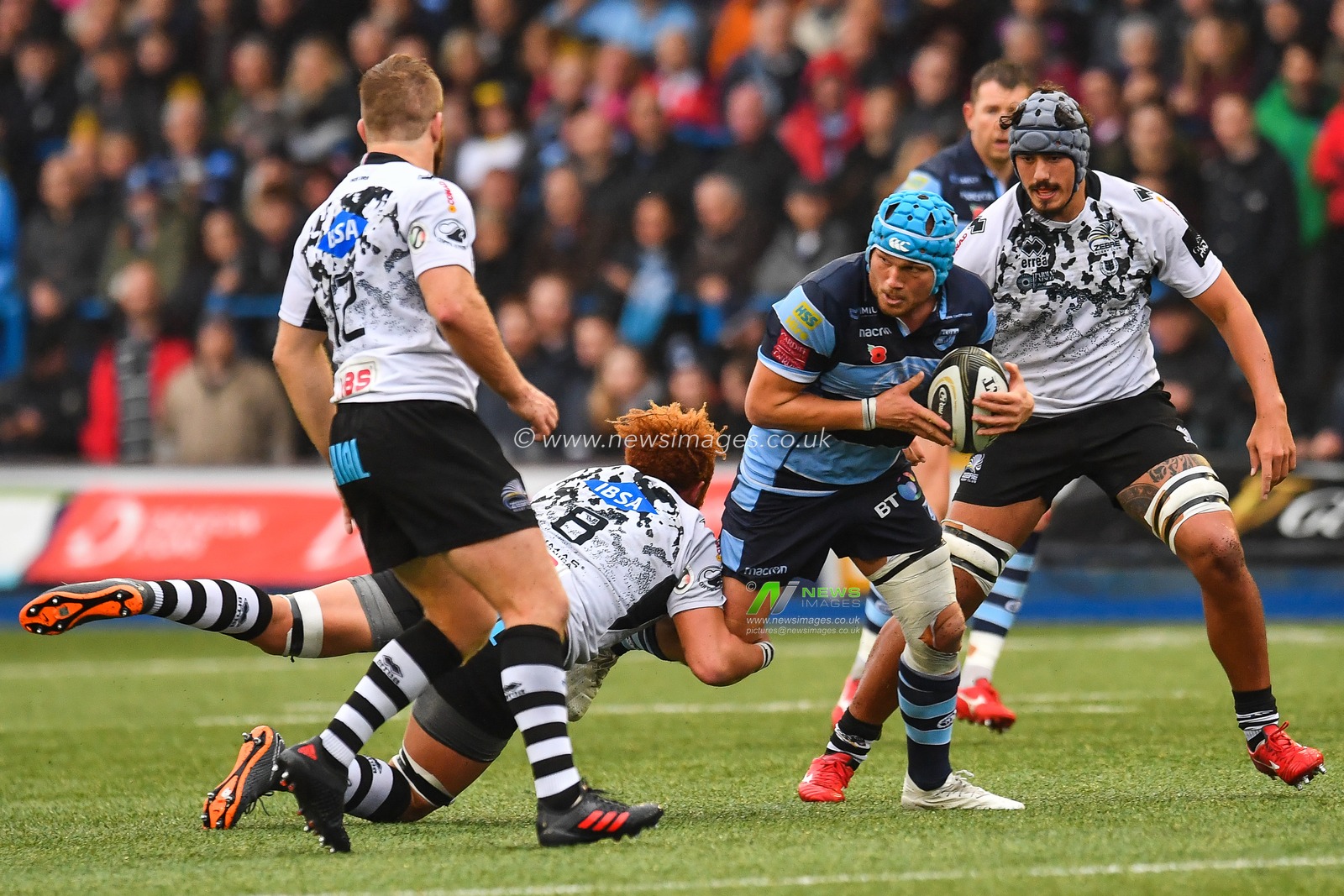 4th November , Cardiff Arms Park , Cardiff, Wales ; Guinness pro 14's Cardiff Blues v Zebre ; Olly Robinson of Cardiff Blues is tackled by Antoine Kouassi Koffi of Zebre


Credit:  Craig Thomas/News Images