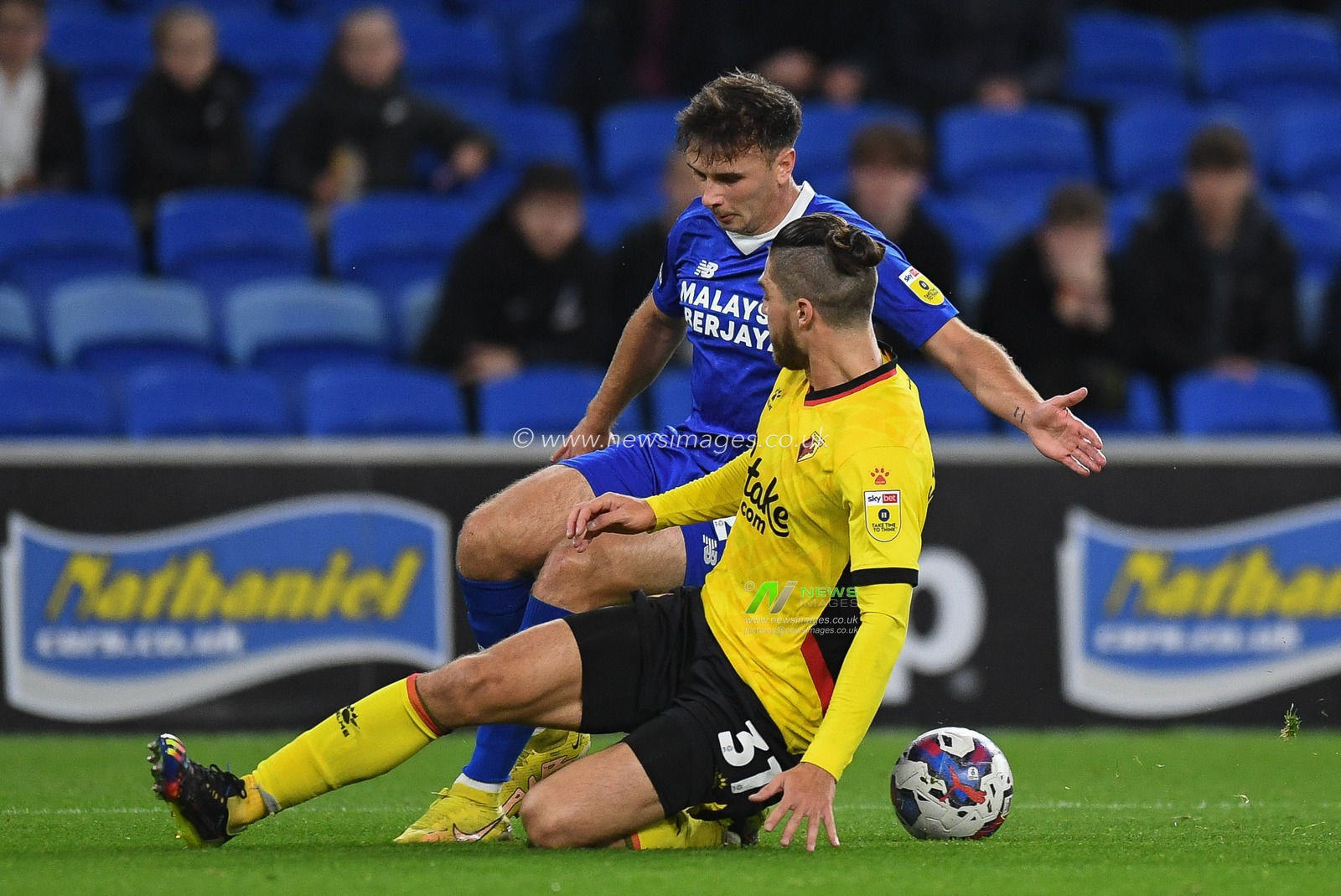 Francisco Sierralta #31 of Watford  tackles Mark Harris #29 of Cardiff City  during the Sky Bet Championship match Cardiff City vs Watford at Cardiff City Stadium, Cardiff, United Kingdom, 2nd November 2022

(Photo by Mike Jones/News Images)