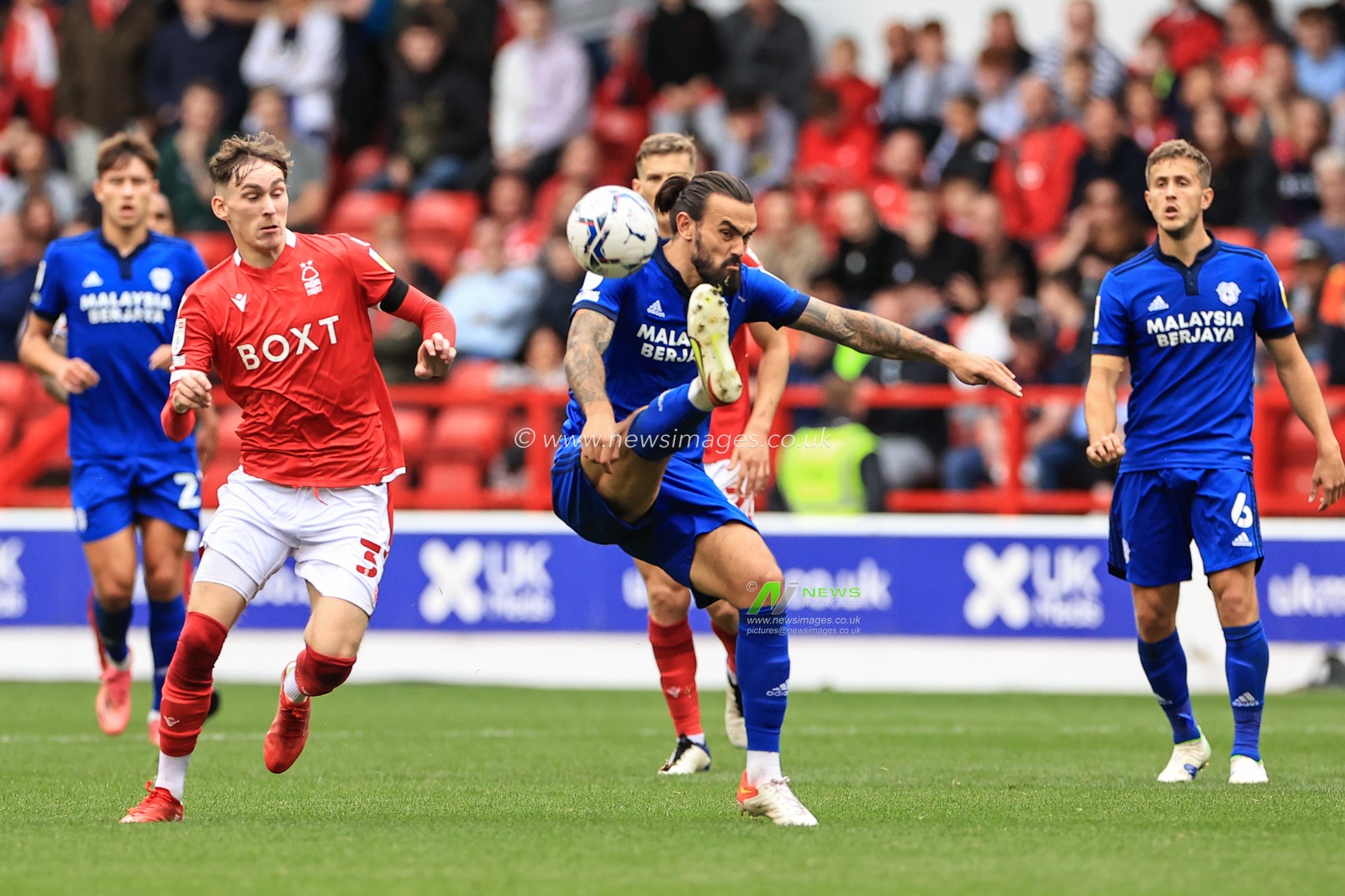 Sean Morrison #4 of Cardiff City clears the ball with a overhead kick