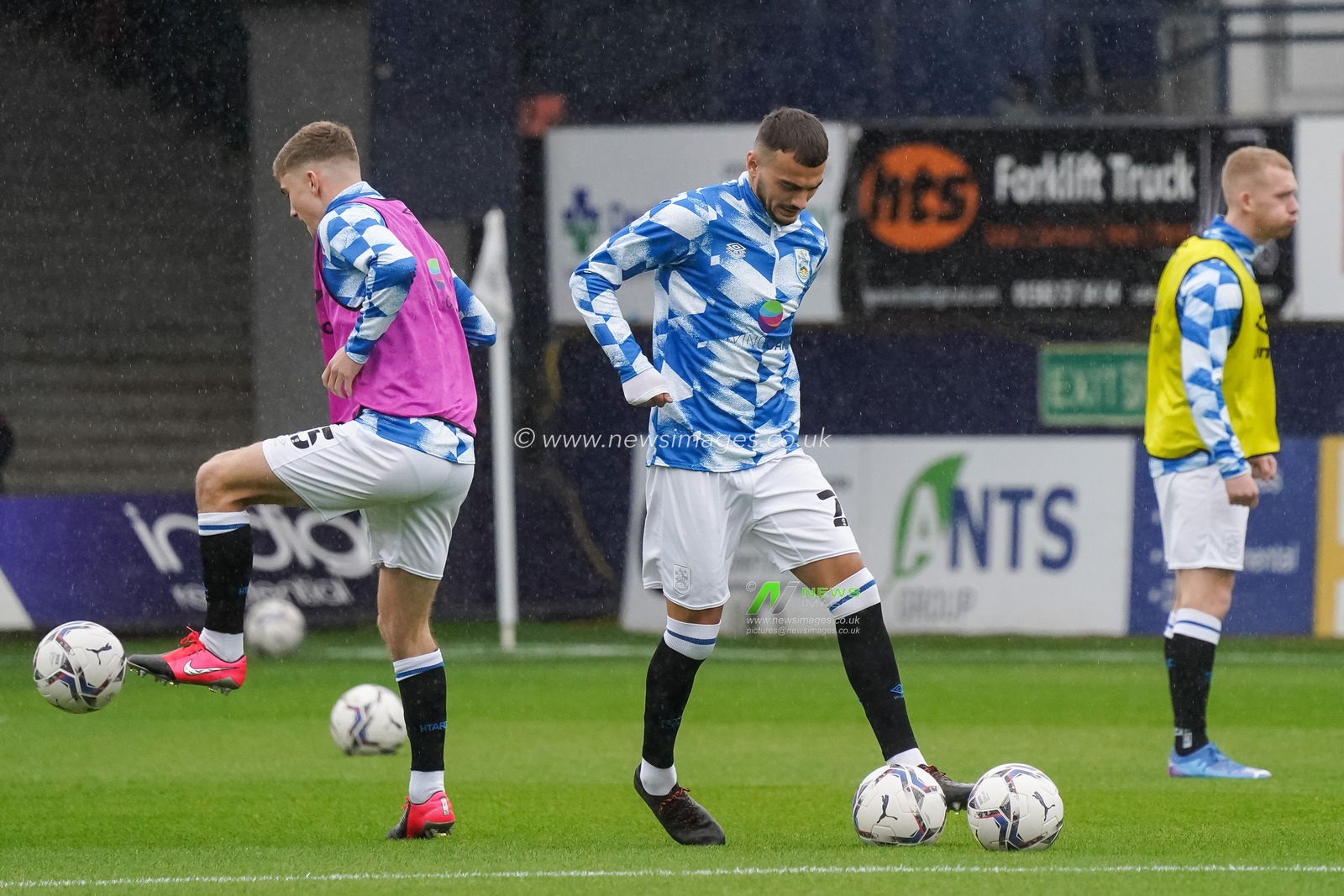 Huddersfield Team warming up prior to the game