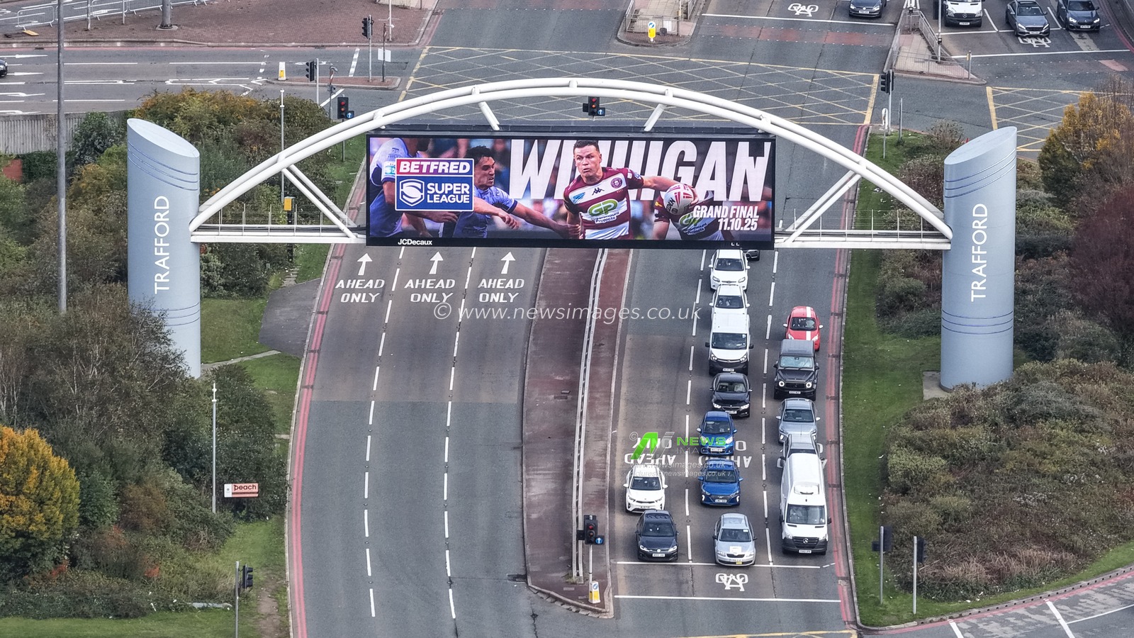 A Wigan Warriors sign on a local LCD advertising board during the 2025 Betfred Super League Grand Final Hull KR v Wigan Warriors at Old Trafford, Manchester, United Kingdom, 11th October 2025

(Photo by Mark Cosgrove/News Images)