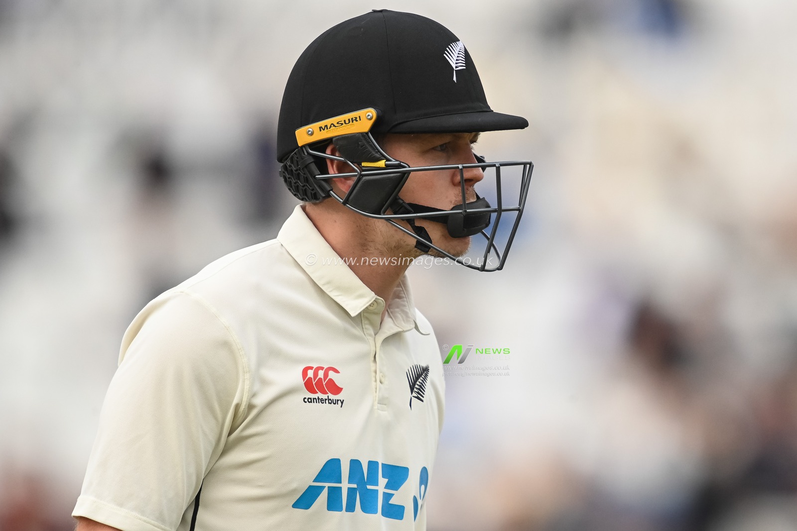 Michael Bracewell of New Zealand leavers the field after being caught by Stuart Broad of England