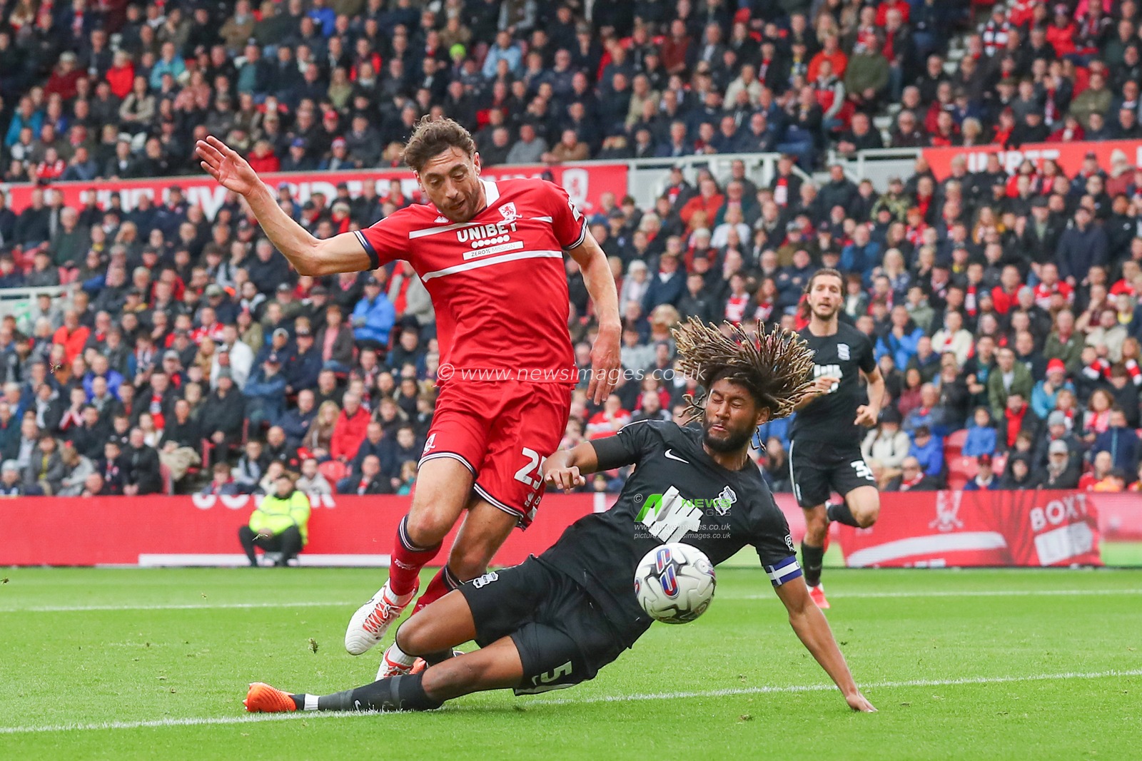 Dion Sanderson #5 of Birmingham City tackles Matt Crooks #25 of Middlesbrough during the Sky Bet Championship match Middlesbrough vs Birmingham City at Riverside Stadium, Middlesbrough, United Kingdom, 21st October 2023

(Photo by Gareth Evans/News Images)