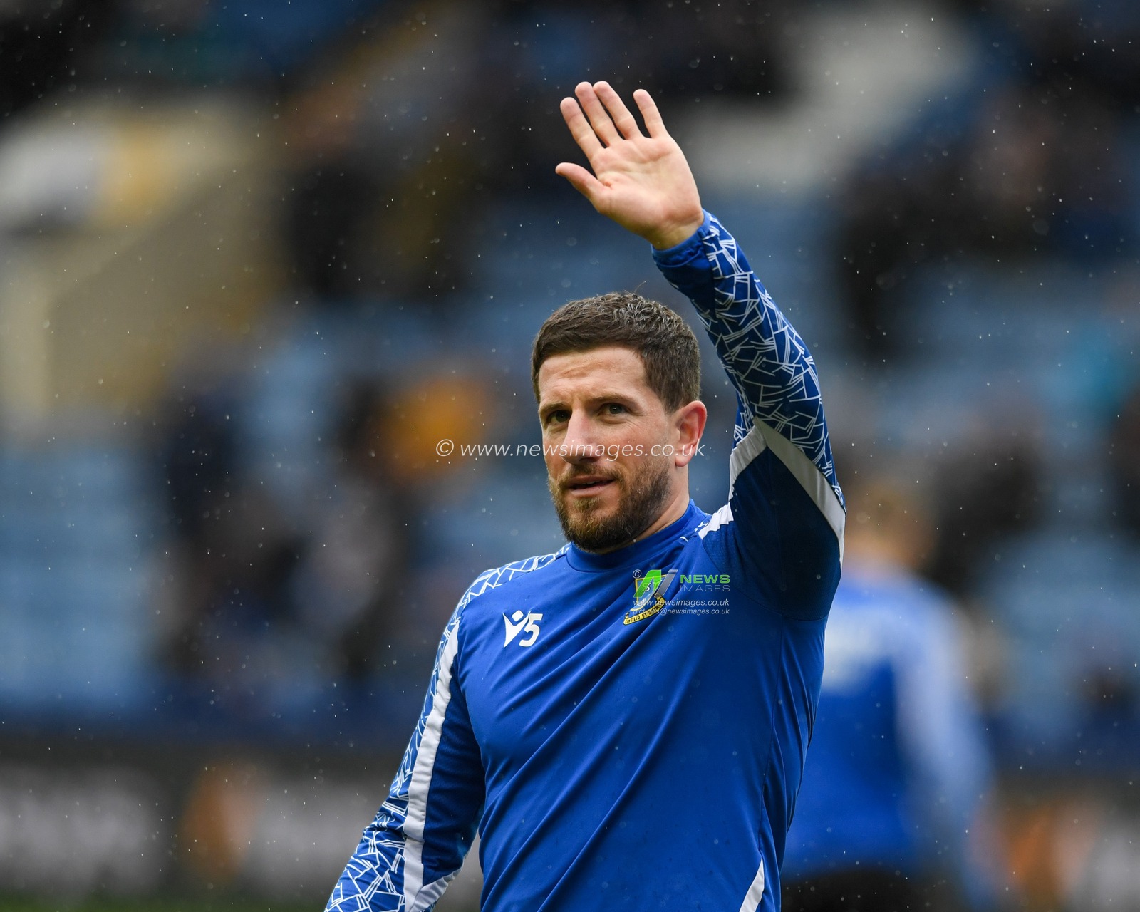 Sam Hutchinson #5 of Sheffield Wednesday waves to the crowd before the game