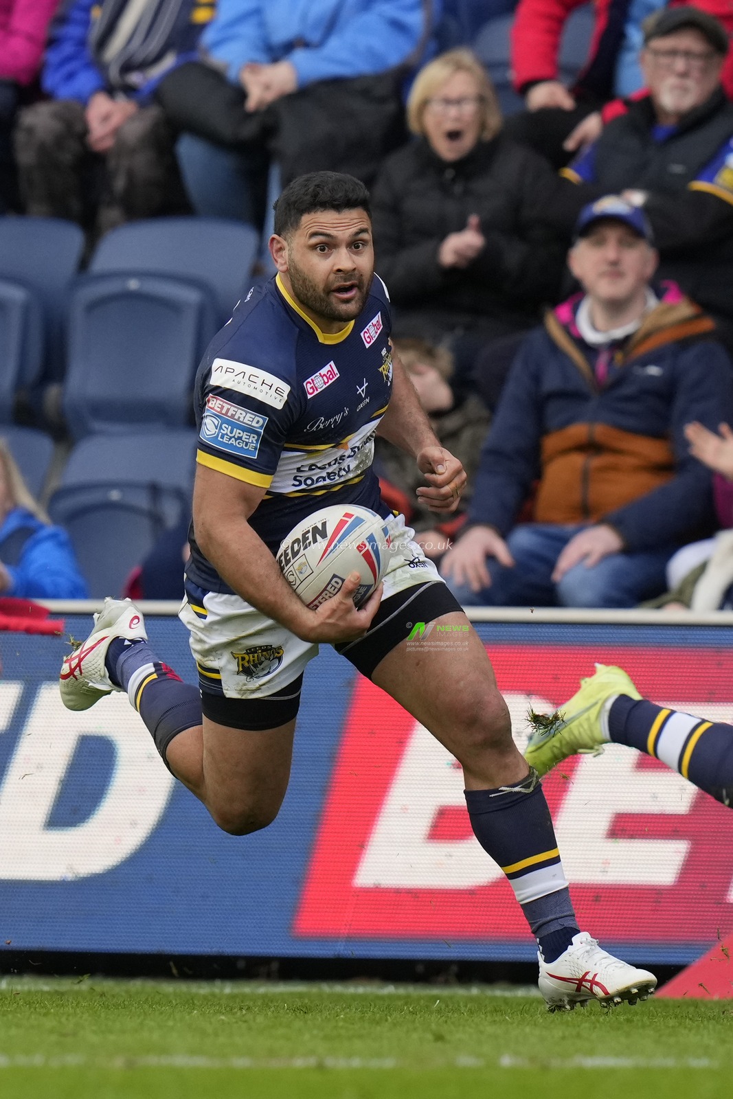 Rhyse Martin #12 of Leeds Rhinos makes a break during the Betfred Super League Round 6 match Leeds Rhinos vs Catalans Dragons at Headingley Stadium, Leeds, United Kingdom, 25th March 2023

(Photo by Steve Flynn/News Images)