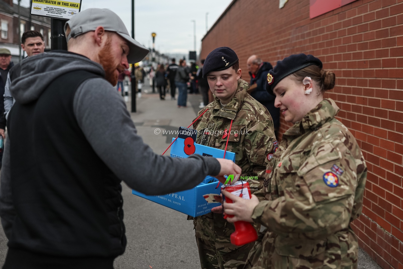 A fan buys a poppy on Remembrance Day during the Sky Bet Championship match Sheffield United vs Sheffield Wednesday at Bramall Lane, Sheffield, United Kingdom, 10th November 2024

(Photo by Mark Cosgrove/News Images)