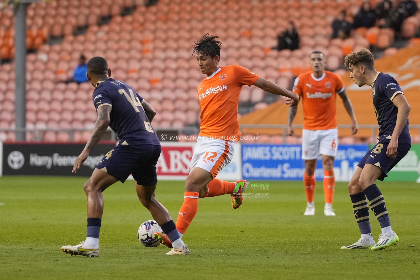 Kenny Dougall #12 of Blackpool sets to pass during the Sky Bet League 1 match Blackpool vs Port Vale at Bloomfield Road, Blackpool, United Kingdom, 15th August 2023

(Photo by Steve Flynn/News Images)