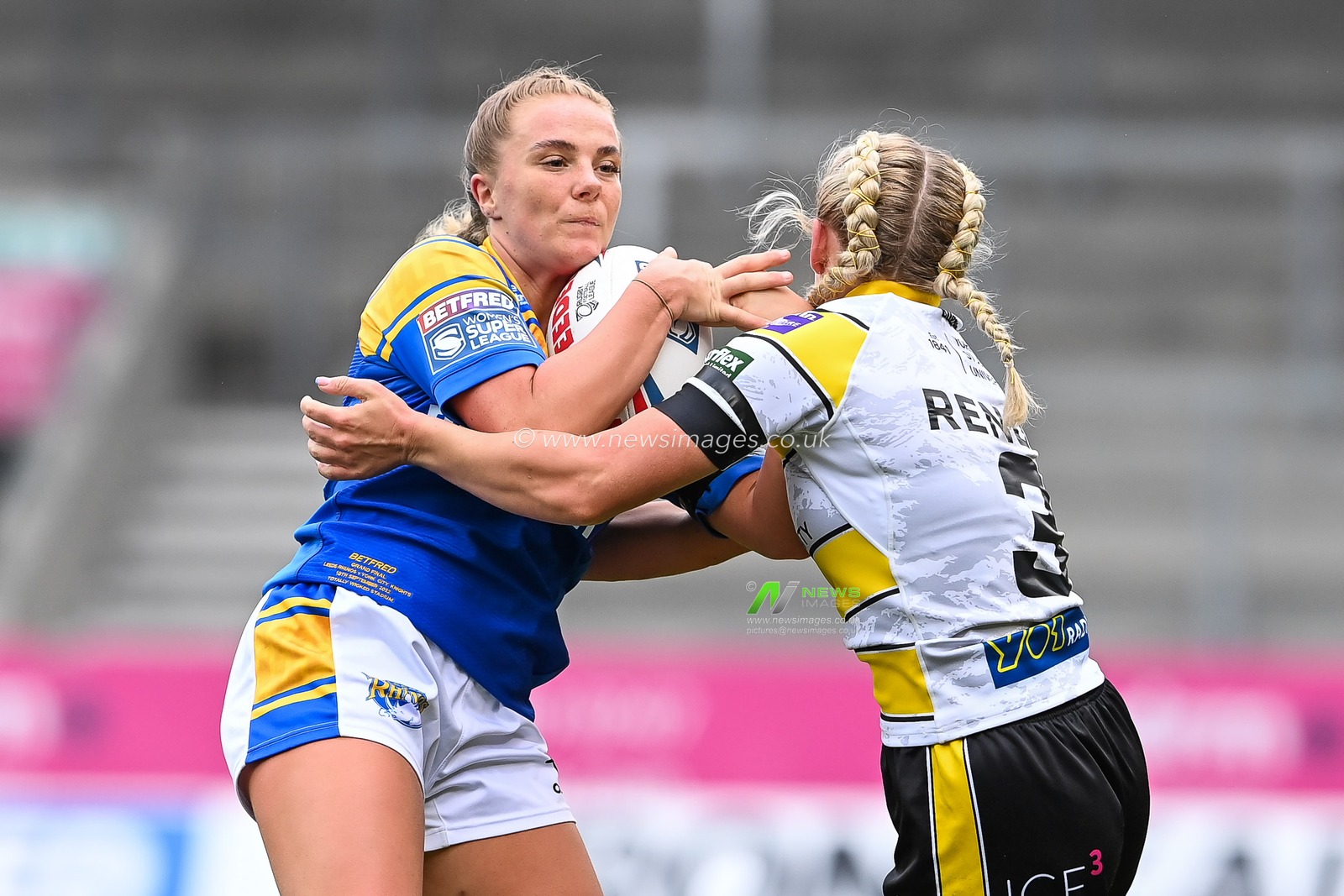 Lucy Murray of Leeds Rhinos Women is tackled by Tamzin Renouf of York City Knights Women during the Betfred Women's Super League Grand Final York CIty Knights Women vs Leeds Rhinos Women at Totally Wicked Stadium, St Helens, United Kingdom, 18th September 2022

(Photo by Craig Thomas/News Images)