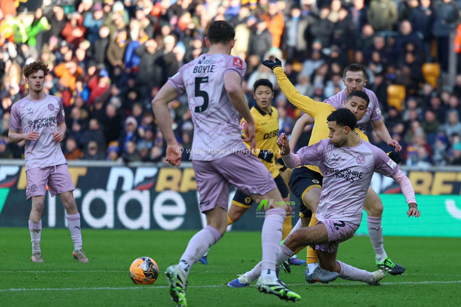 Luca Hoole of Shrewsbury Town crosses the ball during the Emirates FA Cup Third Round match Wolverhampton Wanderers vs Shrewsbury Town at Molineux, Wolverhampton, United Kingdom, 10th January 2026

(Photo by Euan Manning/News Images)