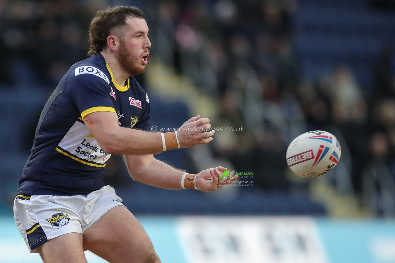 Cameron Smith #13 of Leeds Rhinos passes the ball during the Rugby League Pre Season match Leeds Rhinos vs Bradford Bulls at Headingley Stadium, Leeds, United Kingdom, 29th January 2023

(Photo by James Heaton/News Images)