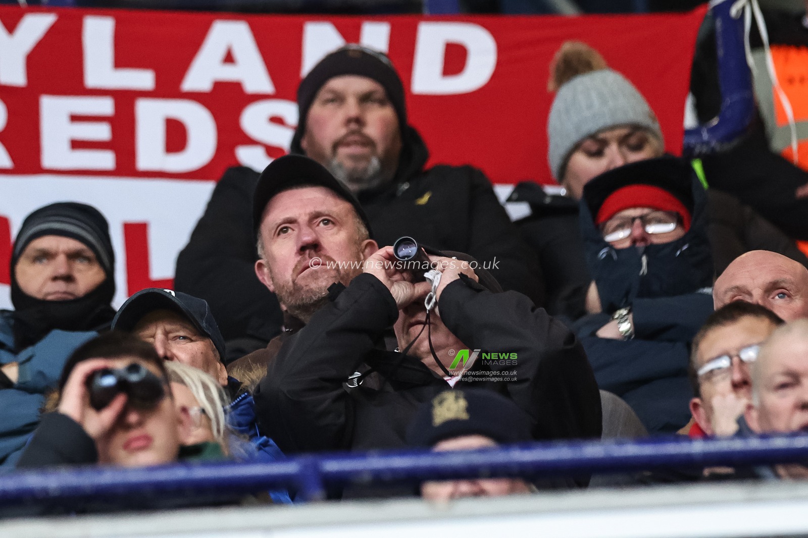 A Barnsley fans watches the game through a looking glass during the Sky Bet League 1 match Bolton Wanderers vs Barnsley at Toughsheet Community Stadium, Bolton, United Kingdom, 3rd February 2024

(Photo by Mark Cosgrove/News Images)