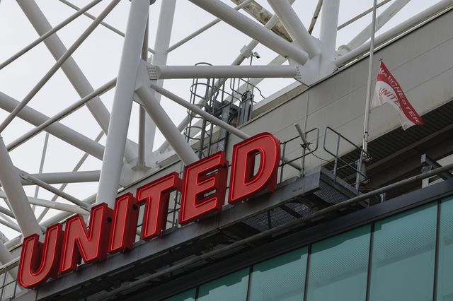 Fans pay tribute to the late Sir Bobby Charlton outside of Old Trafford