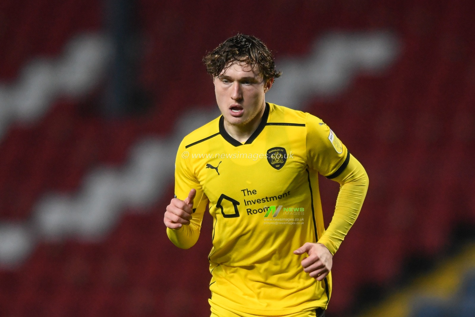 Callum Styles #4 of Barnsley in action during the game