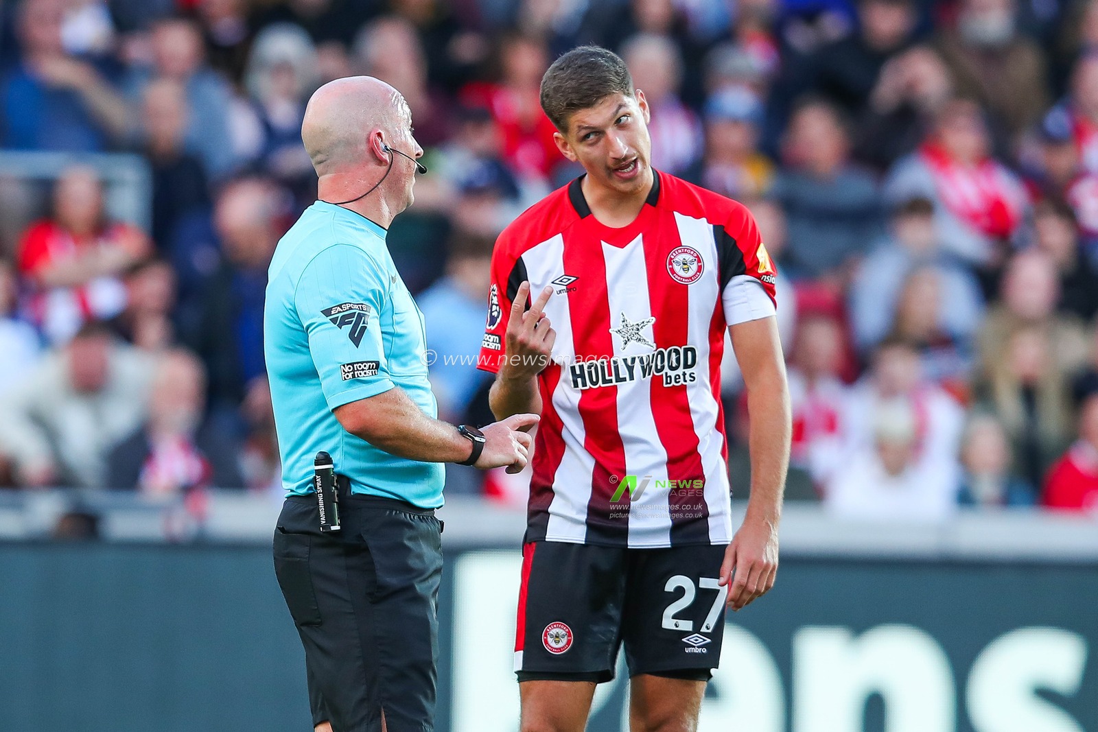 Vitaly Janelt of Brentford appeals for a penalty to referee Simon Hooper during the Premier League match Brentford vs West Ham United at The Gtech Community Stadium, London, United Kingdom, 28th September 2024

(Photo by Izzy Poles/News Images)