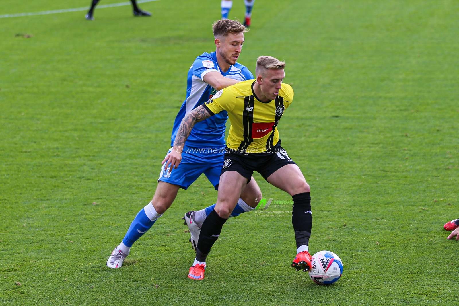 Calvin Miller (19) of Harrogate Town in action during the game