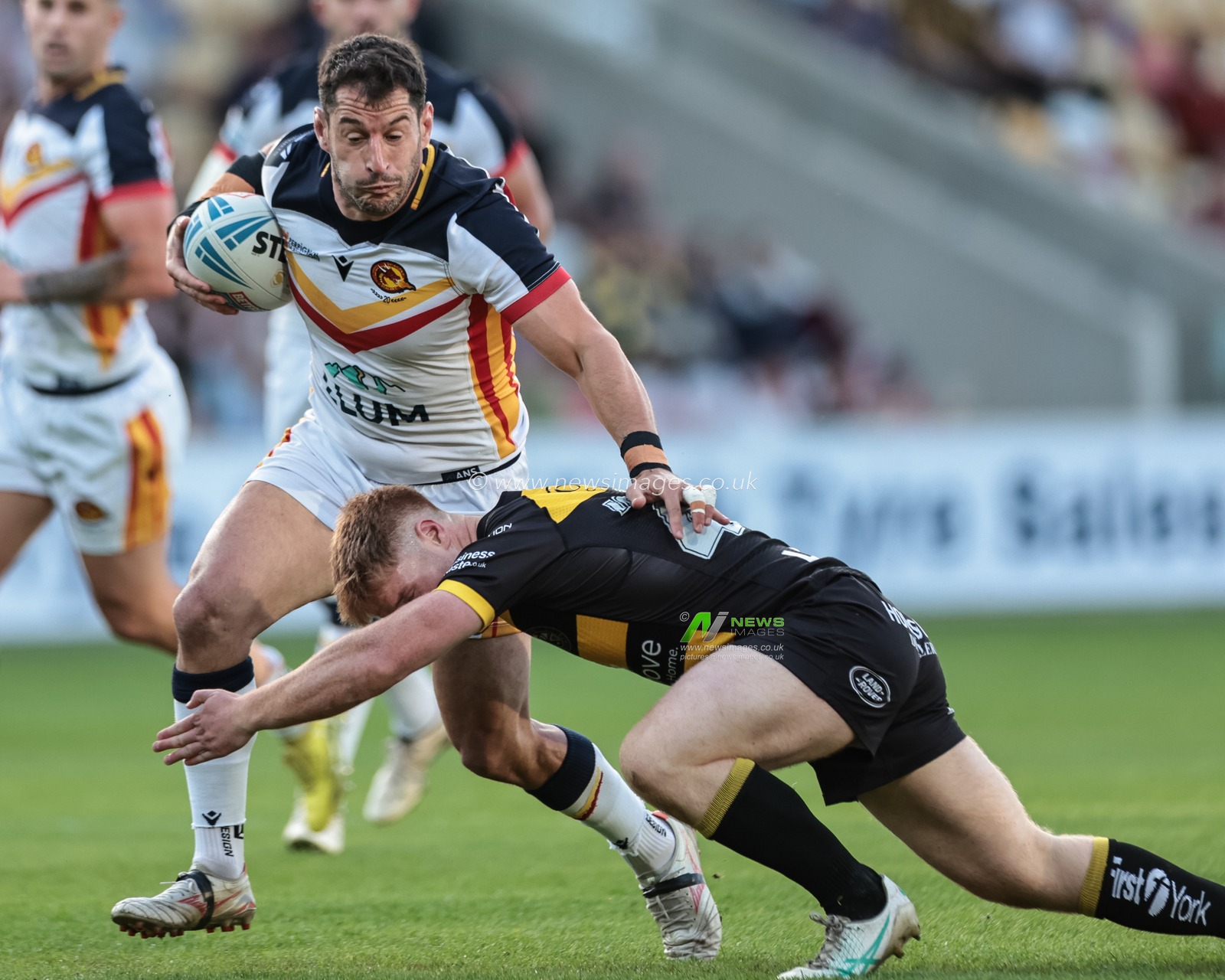 Benjamin Garcia of Catalans Dragons is tackled by Tom Inman of York Knights during the Betfred Super League round 12 match York Knights vs Catalans Dragons at LNER Community Stadium, York, United Kingdom on 23 May 2026

(Photo by Mark Cosgrove/News Images)