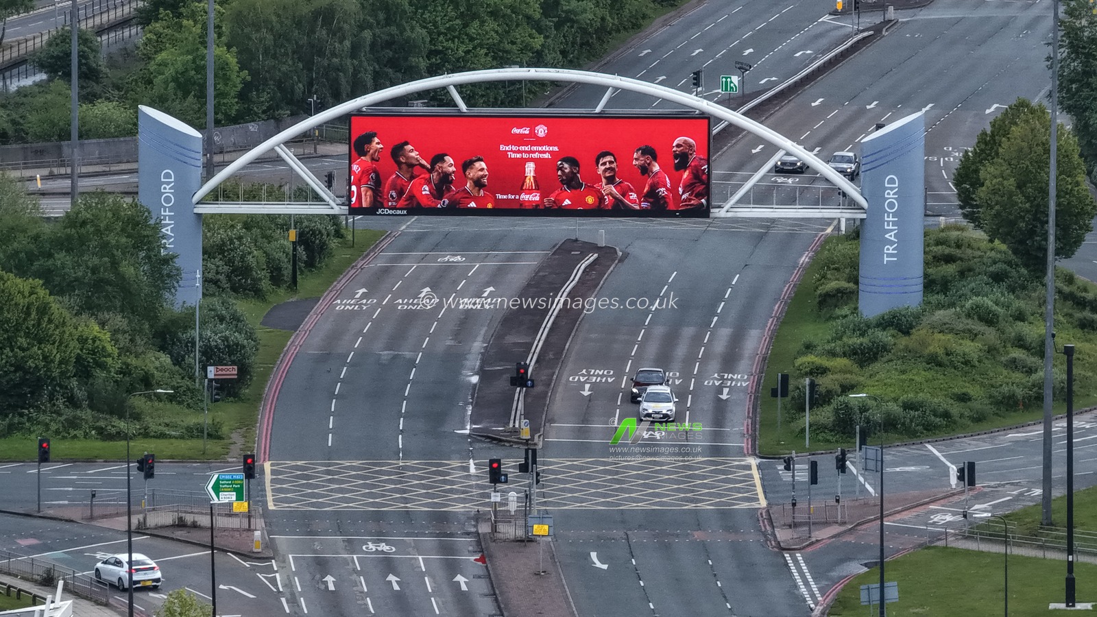 A Manchester United Coca Cola advertisement on the LCD over a road during the Premier League match Manchester United vs Nottingham Forest at Old Trafford, Manchester, United Kingdom on 17 May 2026

(Photo by Mark Cosgrove/News Images)