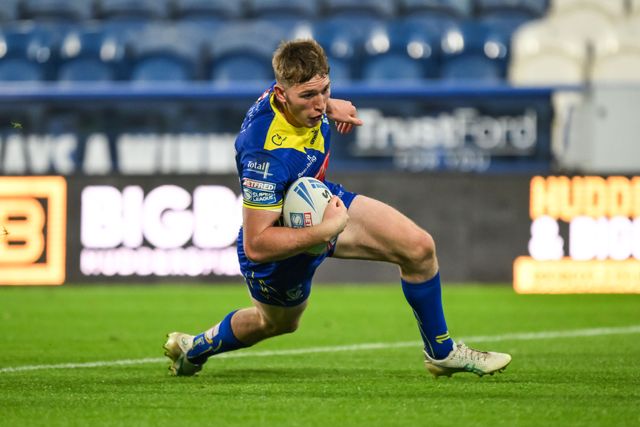 Matty Nicholson of Warrington Wolves goes over for a try during the Betfred Super League Round 26 match Huddersfield Giants vs Warrington Wolves at John Smith's Stadium, Huddersfield, United Kingdom, 14th September 2024

(Photo by Craig Thomas/News Images)