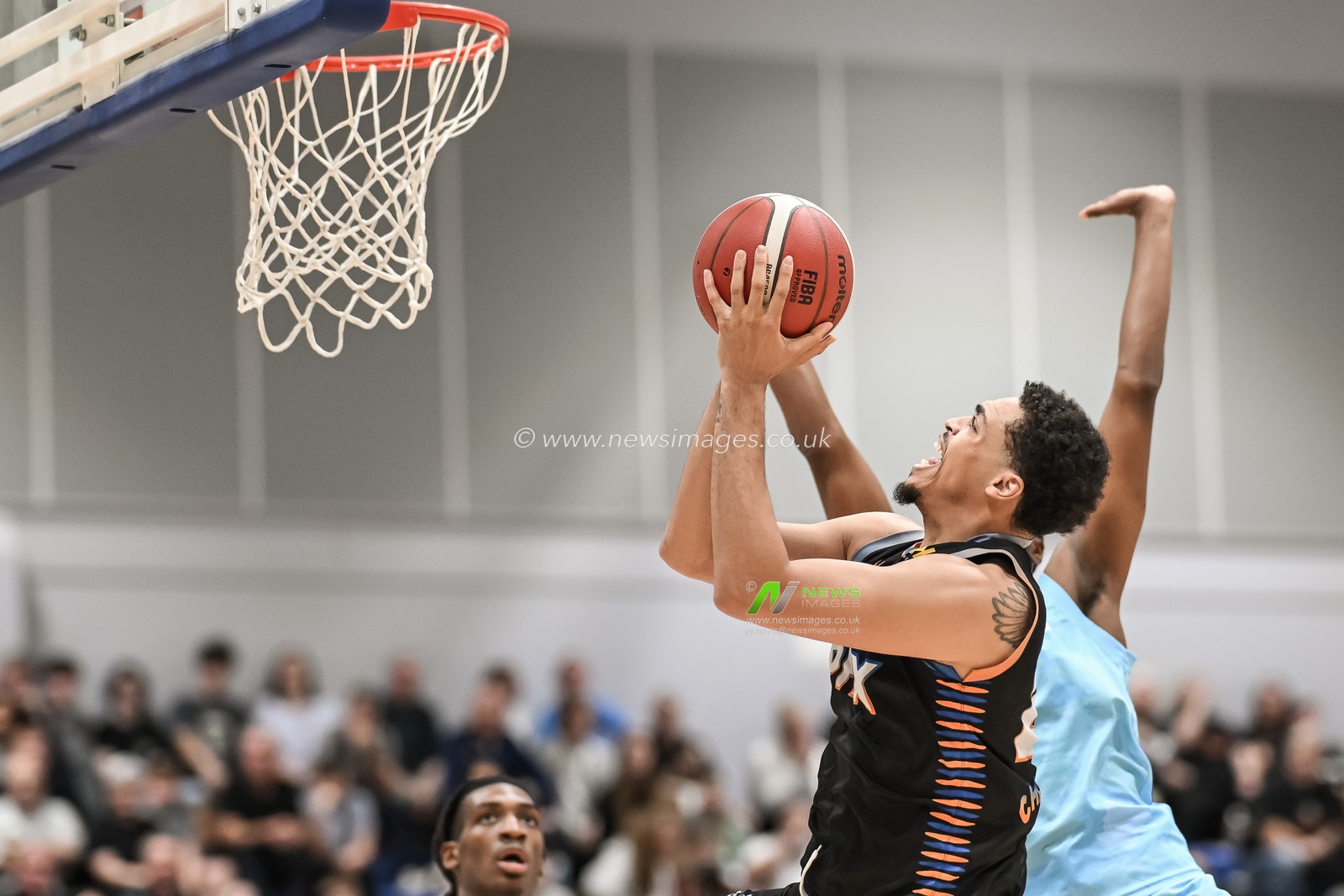 Ethan Chargois of Cheshire Phoenix drives to the net during the British Basketball Championship match Cheshire Phoenix vs Surrey Scorchers at Ellesmere Port Sports Village, Ellesmere Port, United Kingdom, 19th November 2023

(Photo by Craig Thomas/News Images)