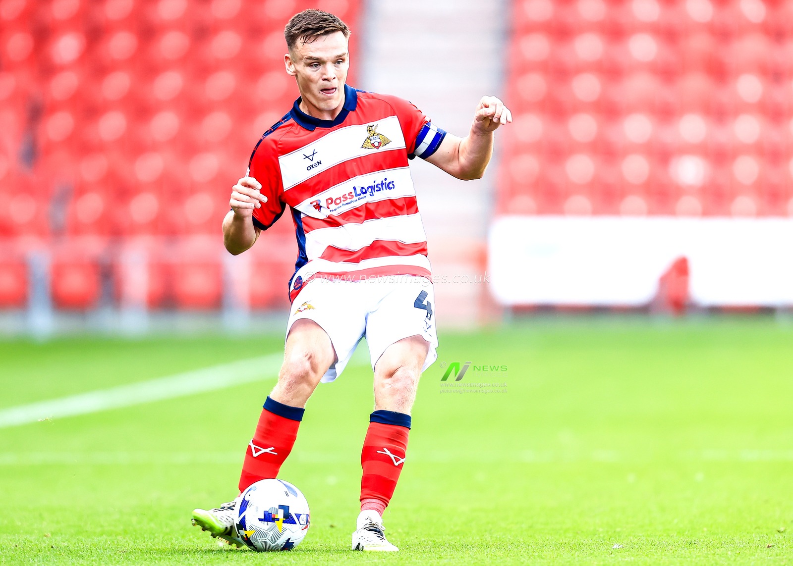 Owen Bailey of Doncaster Rovers passes the ball during the Sky Bet League 1 match Doncaster Rovers vs Exeter City at Eco-Power Stadium, Doncaster, United Kingdom, 2nd August 2025

(Photo by Richard Bierton/News Images)